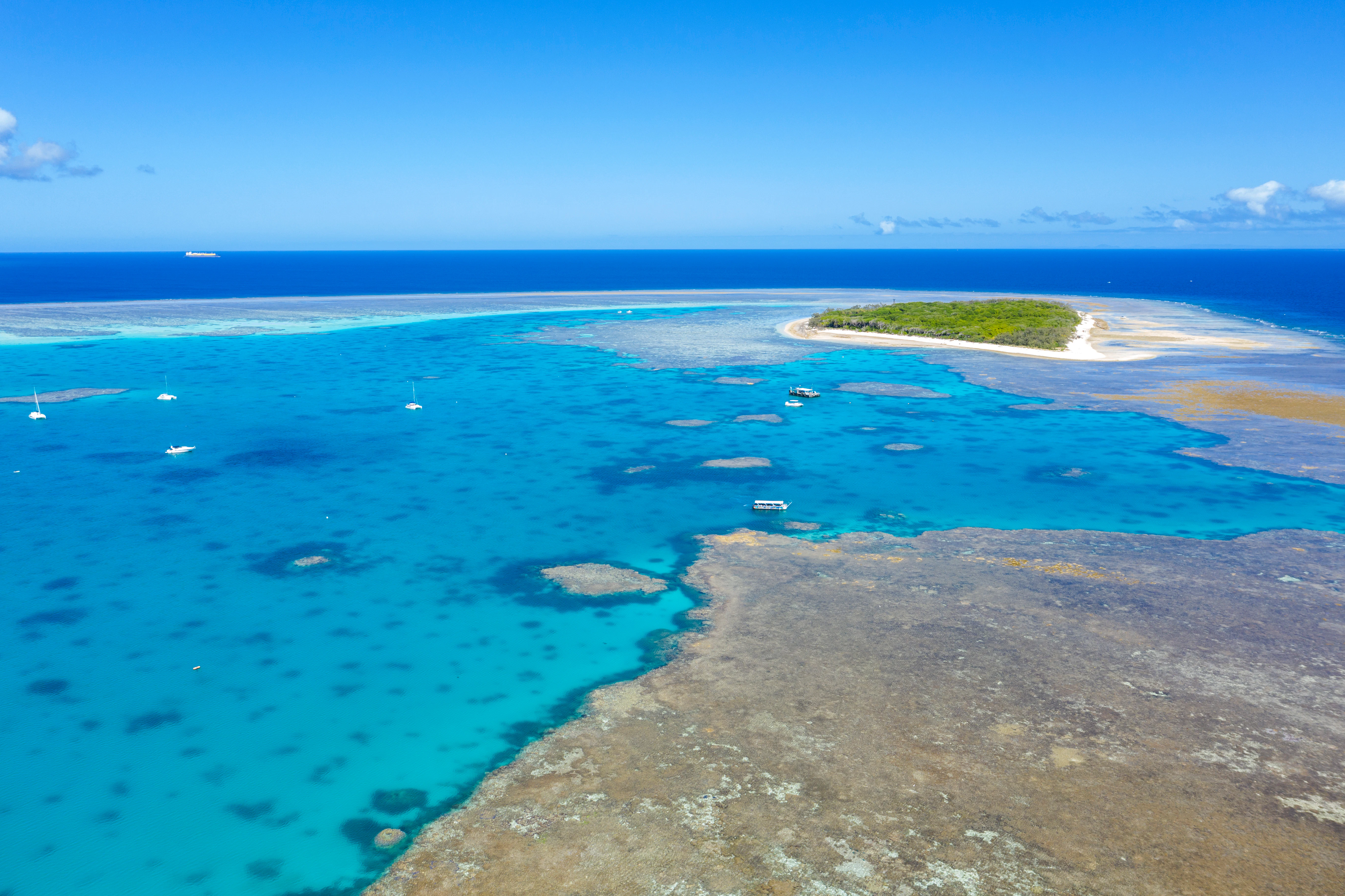 Aerial view over the blue water of the great Barrier Reef