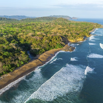 GettyImages-2172630174.jpg
Aerial view, rainforest, sandy beach and coast with waves, Playa Cocalito, Puntarenas, Costa Rica, Central America