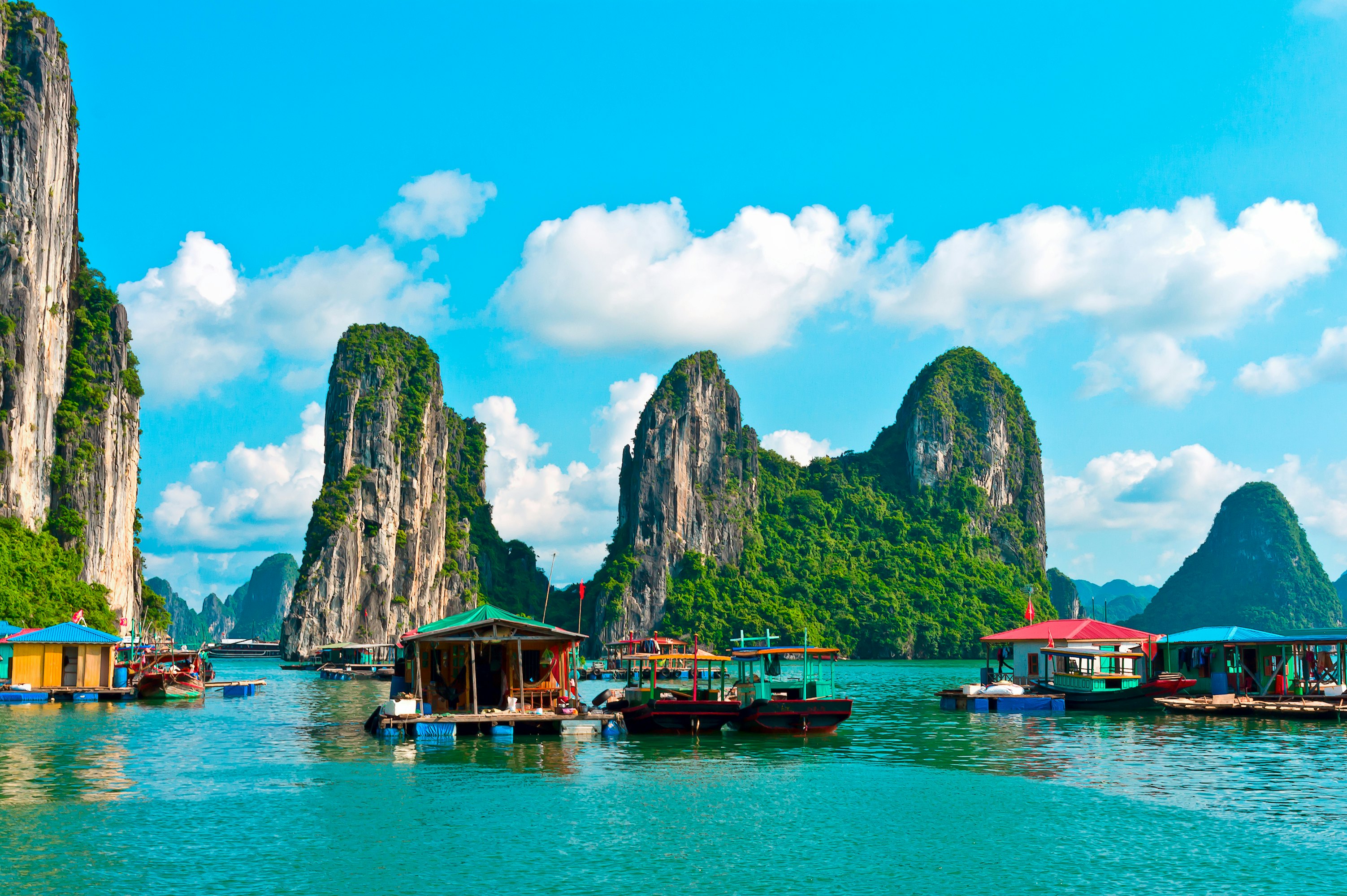 Floating villages and rock islands in Halong Bay