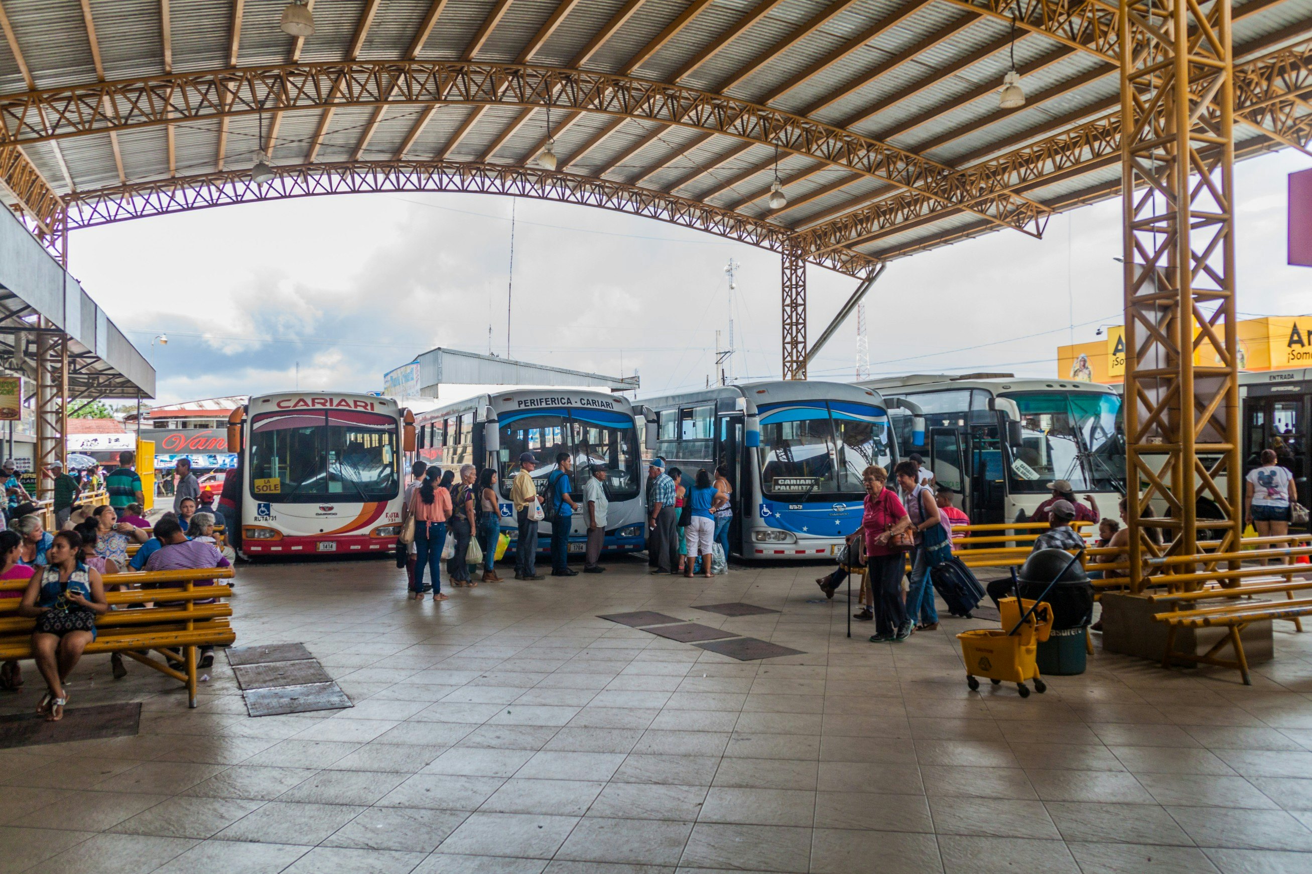 View of buses at the bus station in Cariari town.