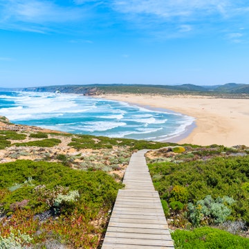 Wooden walkway to beautiful Praia da Bordeira beach, popular place to do kite surfing, Algarve, Portugal, License Type: media, Download Time: 2026-01-05T16:50:37.000Z, User: clairenaylor, Editorial: false, purchase_order: 65050 - Digital Destinations and Articles, job: Online editorial, client: Europe in spring, other: Claire Naylor