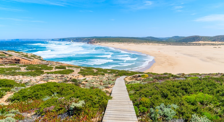 Wooden walkway to beautiful Praia da Bordeira beach, popular place to do kite surfing, Algarve, Portugal, License Type: media, Download Time: 2026-01-05T16:50:37.000Z, User: clairenaylor, Editorial: false, purchase_order: 65050 - Digital Destinations and Articles, job: Online editorial, client: Europe in spring, other: Claire Naylor