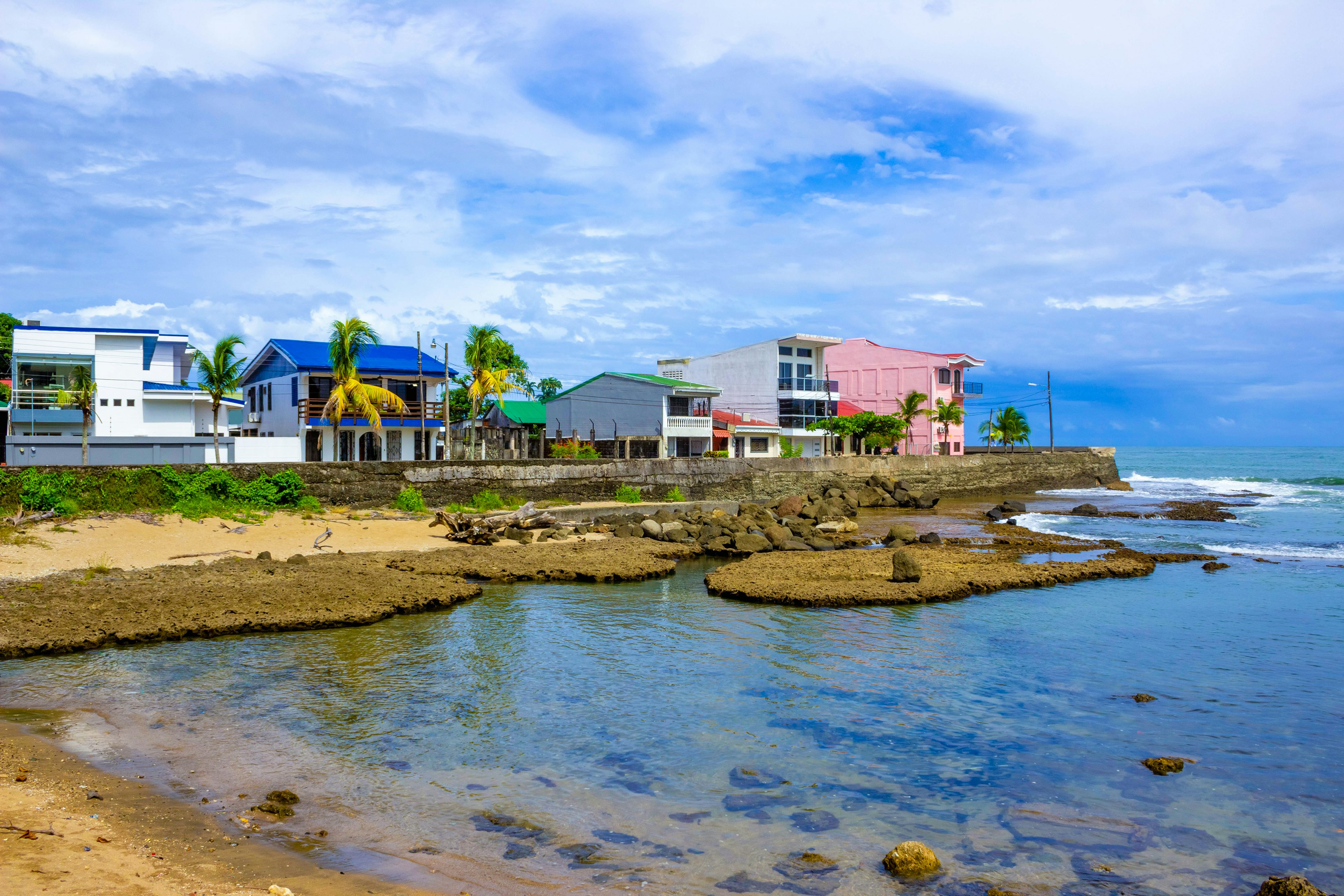 Port Limon - seaport in Costa Rica. Sea and blue sky. Solarisys/Shutterstock