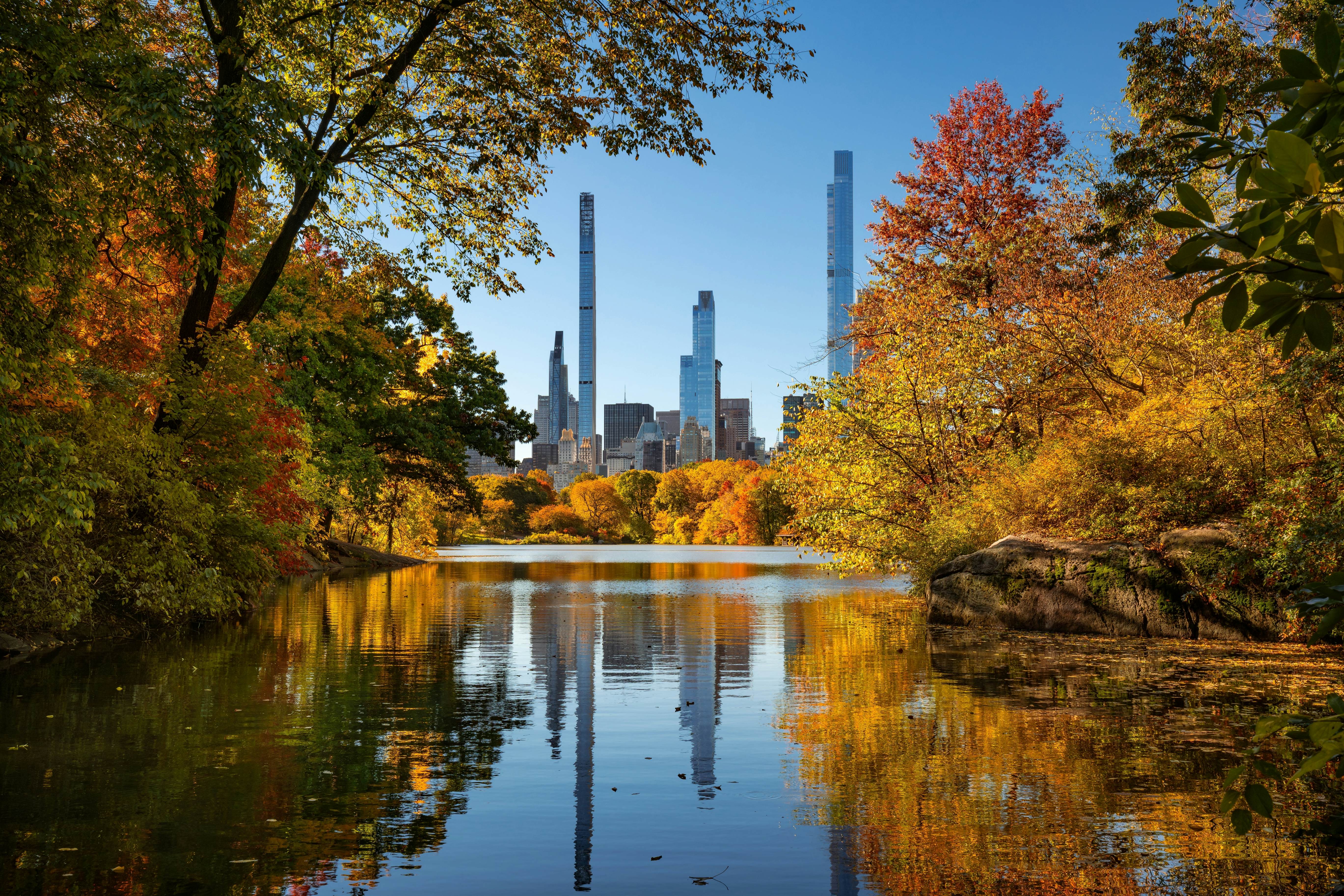 Central Park in Autumn with view of Billionaires' Row skyscrapers from The Lake. Manhattan, New York City, License Type: media, Download Time: 2025-11-26T20:16:04.000Z, User: LP_YKhanna, Editorial: false, purchase_order: 65050 - Digital Destinations and Articles, job: LP, client: App Content, other: Yuvraj Khanna