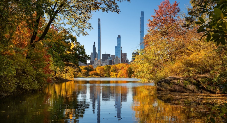 Central Park in Autumn with view of Billionaires' Row skyscrapers from The Lake. Manhattan, New York City, License Type: media, Download Time: 2025-11-26T20:16:04.000Z, User: LP_YKhanna, Editorial: false, purchase_order: 65050 - Digital Destinations and Articles, job: LP, client: App Content, other: Yuvraj Khanna