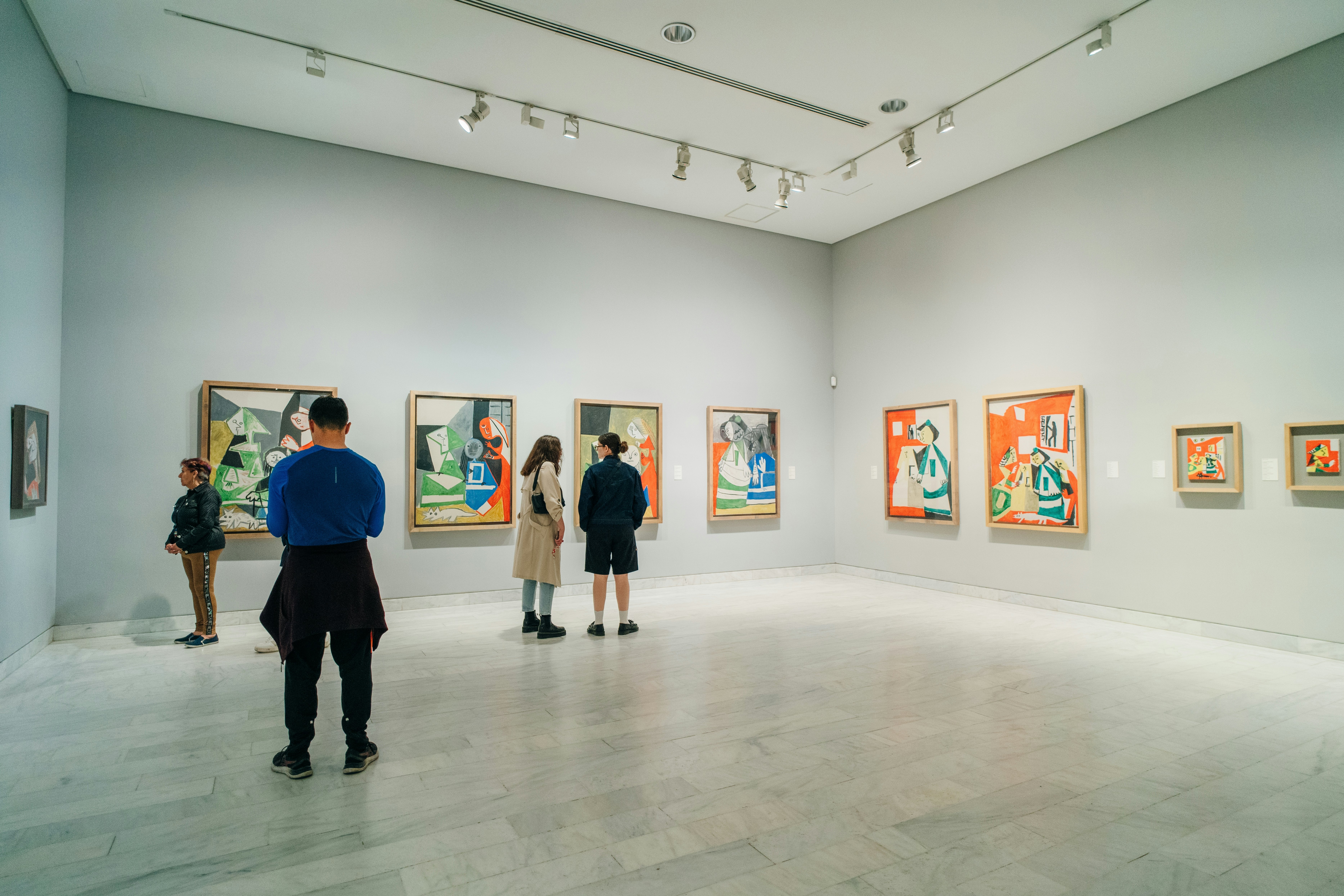 People looking at paintings at the Picasso Museum