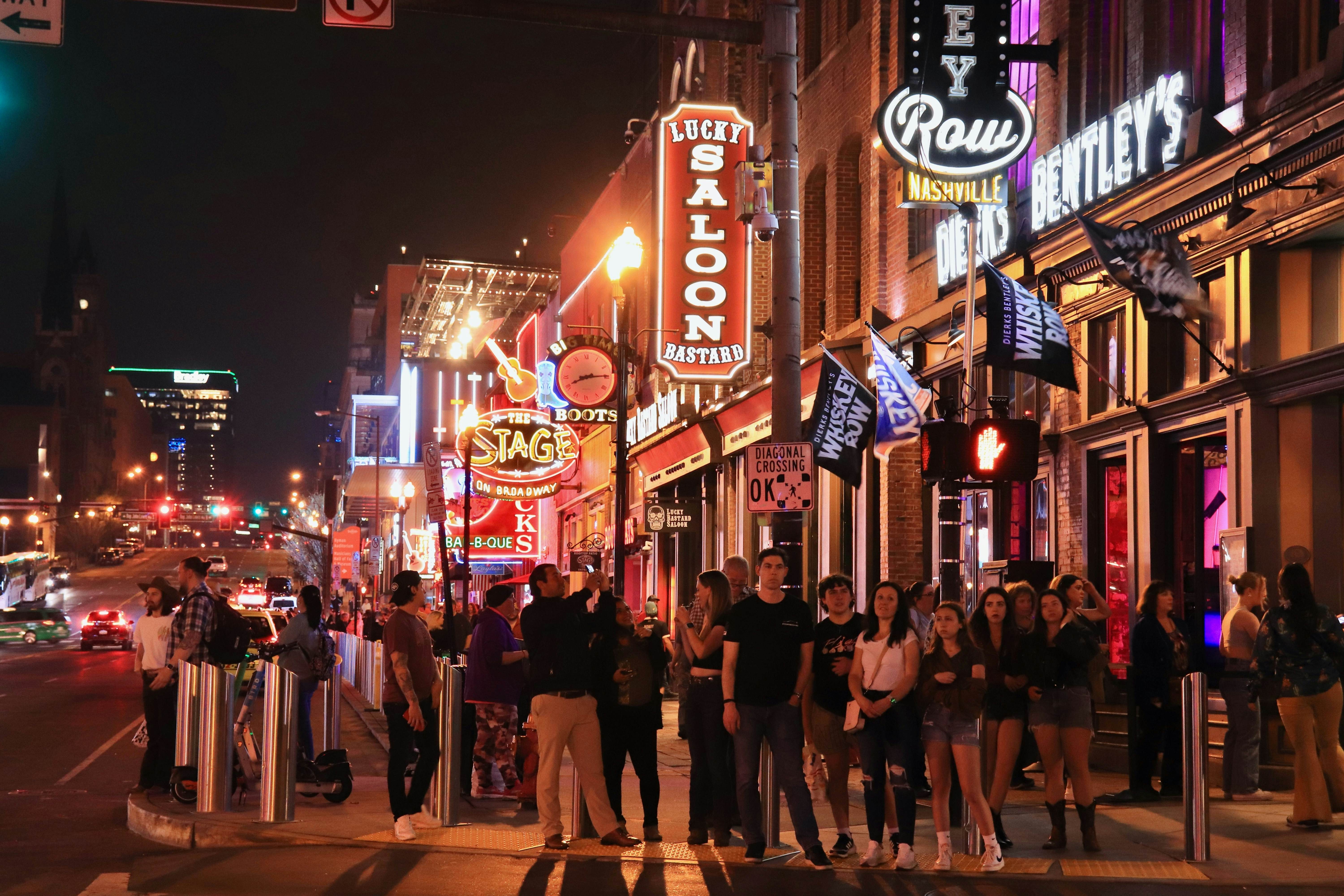 Nashville, TN, USA - April 1, 2024: Famous Lower Broadway Avenue Neon signs. Blues, rock and country music clubs illuminated at night in downtown. This a main Nashville city attraction., License Type: media, Download Time: 2025-01-17T17:02:49.000Z, User: Ppeterson948, Editorial: true, purchase_order: 56500 - T&R or Kids, job: Global Publishing WIP, client: WIP, other: Pia Peterson Haggarty