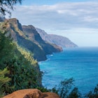 Scenic view of amazing Napali Coast seen from Kalalau Trail, Kauai, Hawaii, USA against blue sky with clouds in the morning; Shutterstock ID 2521379375; purchase_order:65050 - Digital Destinations and Articles; job:Online editorial; client:Epic hikes of the Americas article refresh; other:Ann Douglas Lott
2521379375