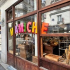Paris, France - August 2, 2024 : Colorful sign with pink, purple, yellow, orange and green letters on the glass window of Mamiche boulangerie in the 9th arrondissement in Paris, License Type: media, Download Time: 2026-01-30T18:33:27.000Z, User: LP_NGMcElroy, Editorial: true, purchase_order: 65050 - Digital Destinations and Articles, job: Lonely Planet digital , client: Lonely Planet digital content, other: Nicole McElroy