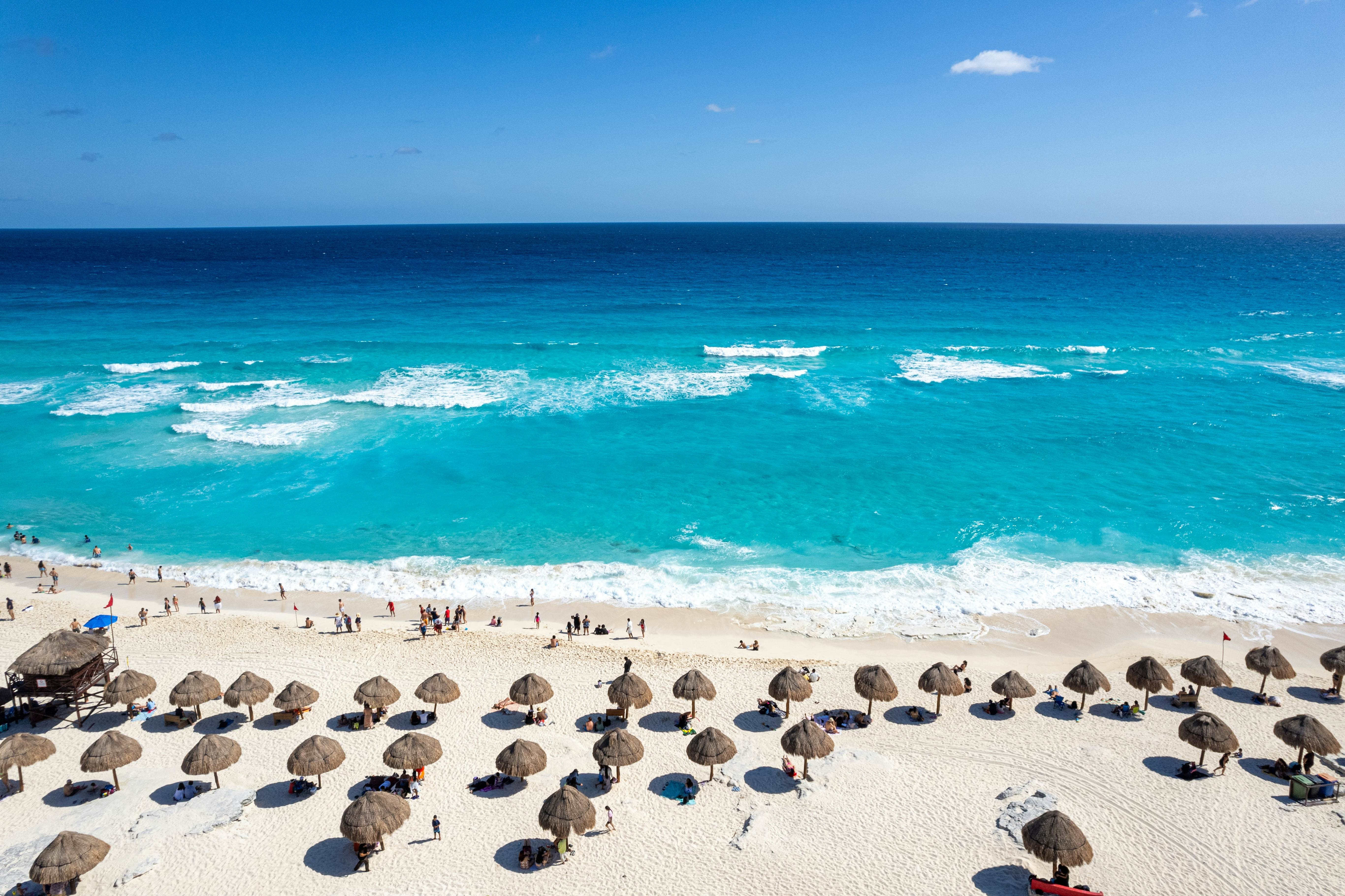 Stunning aerial drone view of the Mirador in Cancun's Hotel Zone, showcasing turquoise waters, white sandy beaches, and a vibrant sunny day, License Type: media, Download Time: 2025-05-22T14:23:48.000Z, User: lonelyplanetmedia, Editorial: false, purchase_order: 65050 - Digital Destinations and Articles, job: Global Publishing WIP, client: Global Publishing WIP, other: Pia Peterson Haggarty // SS Comp Ingestion