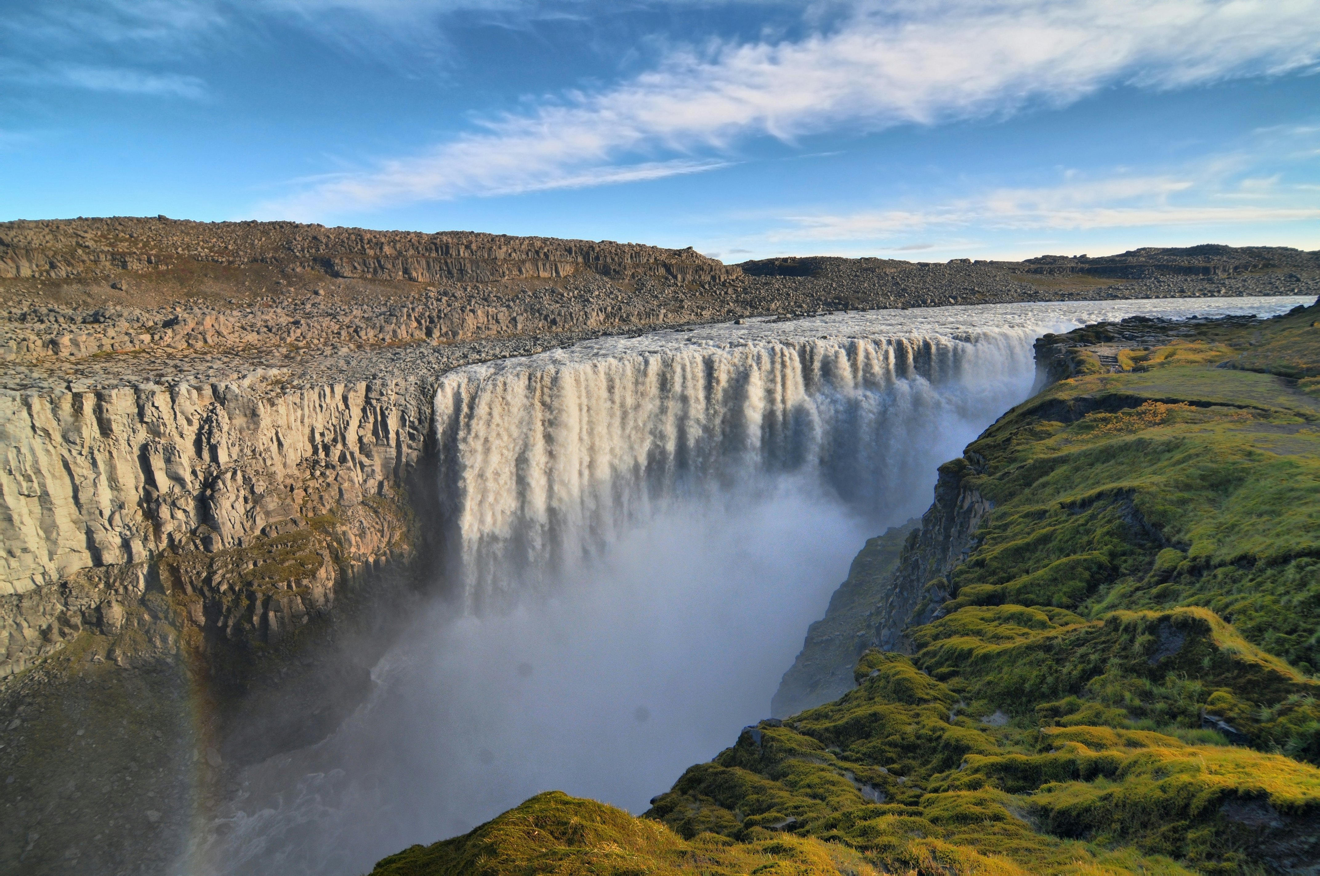 The waterfall of Dettifoss surges into a rocky gorge in Iceland.