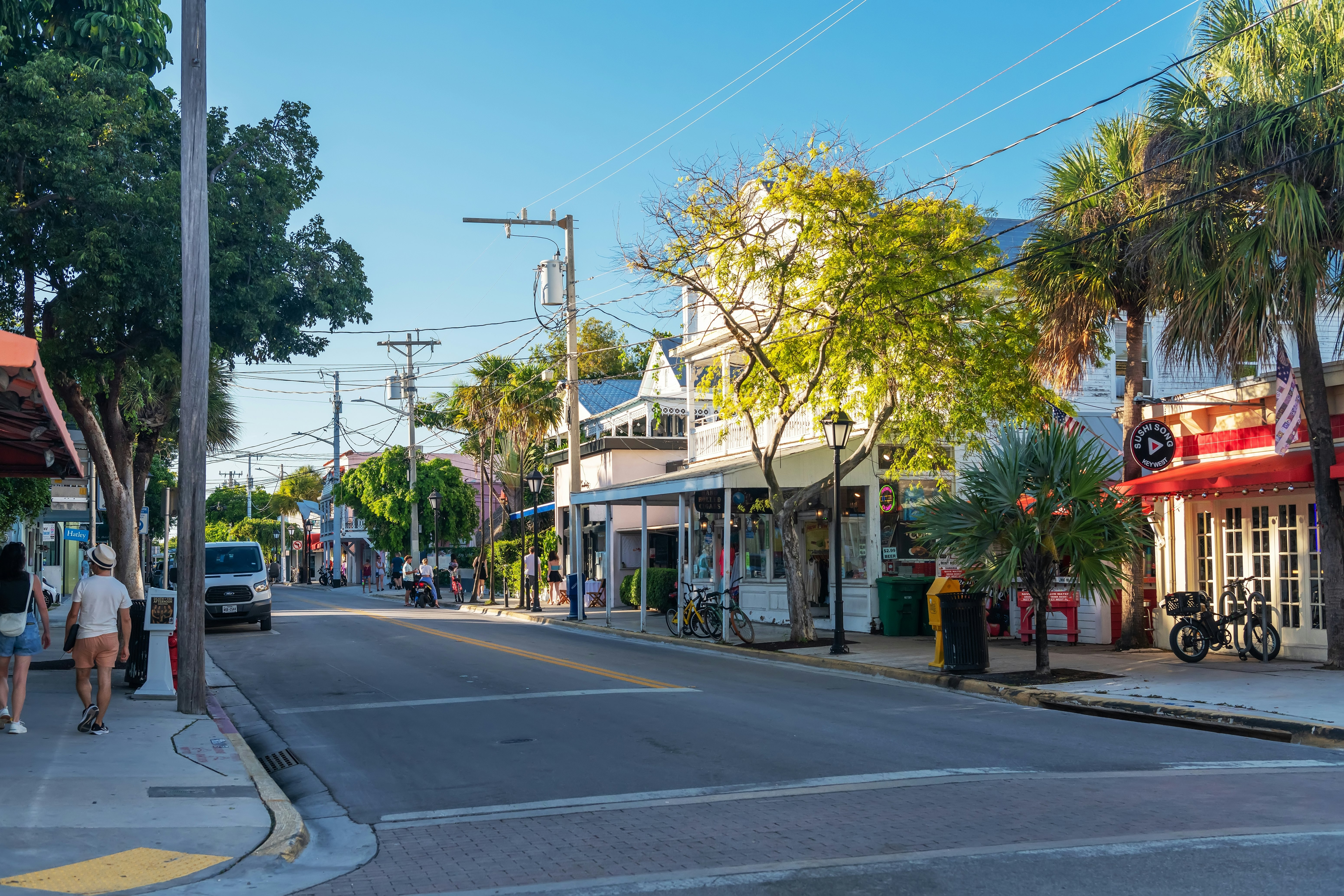 Picturesque street view with local shops and tropical colors in coastal Key West. A popular destination for shopping
