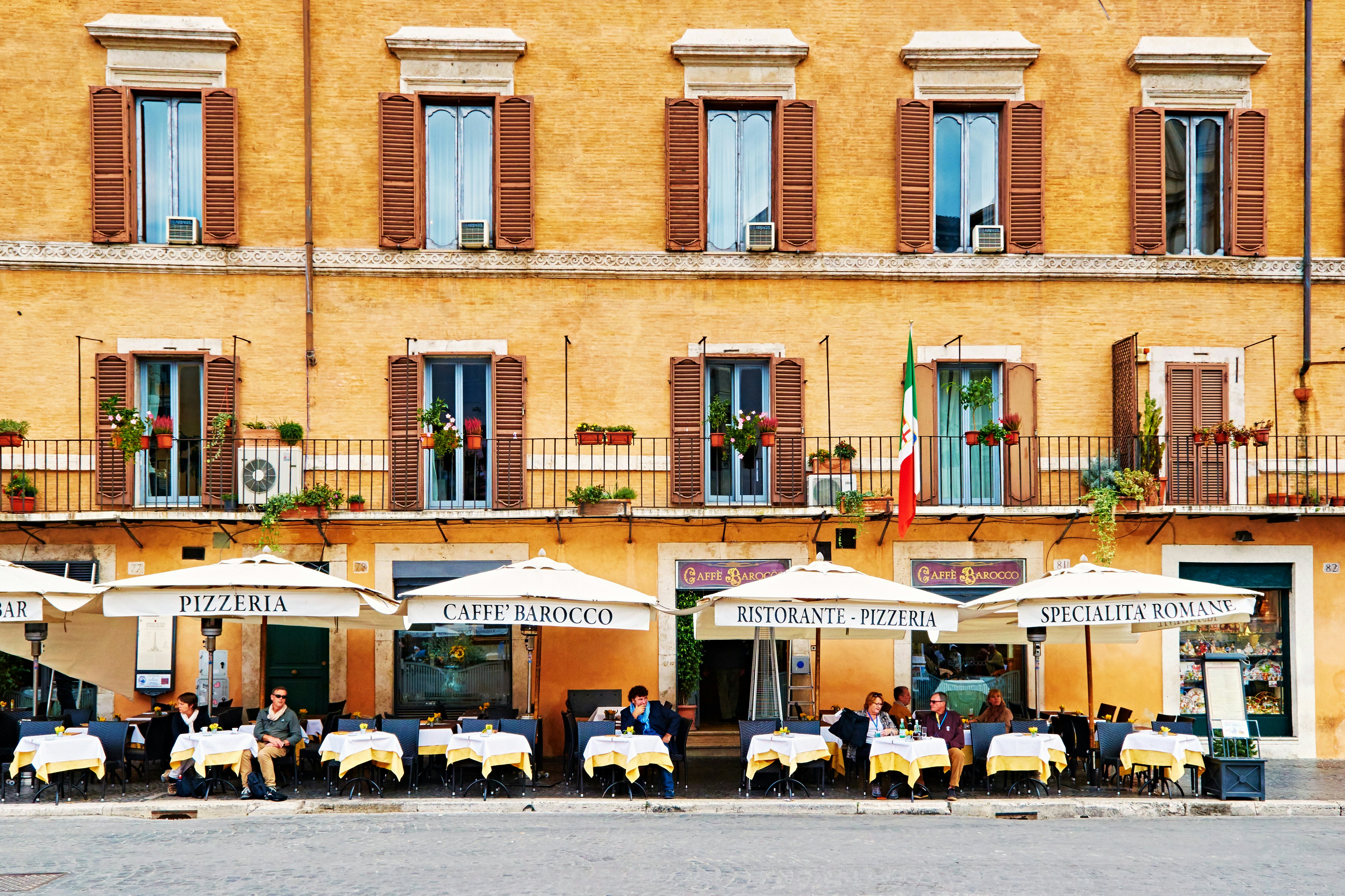 Guests enjoying outdoor dining at Piazza Navona in Rome