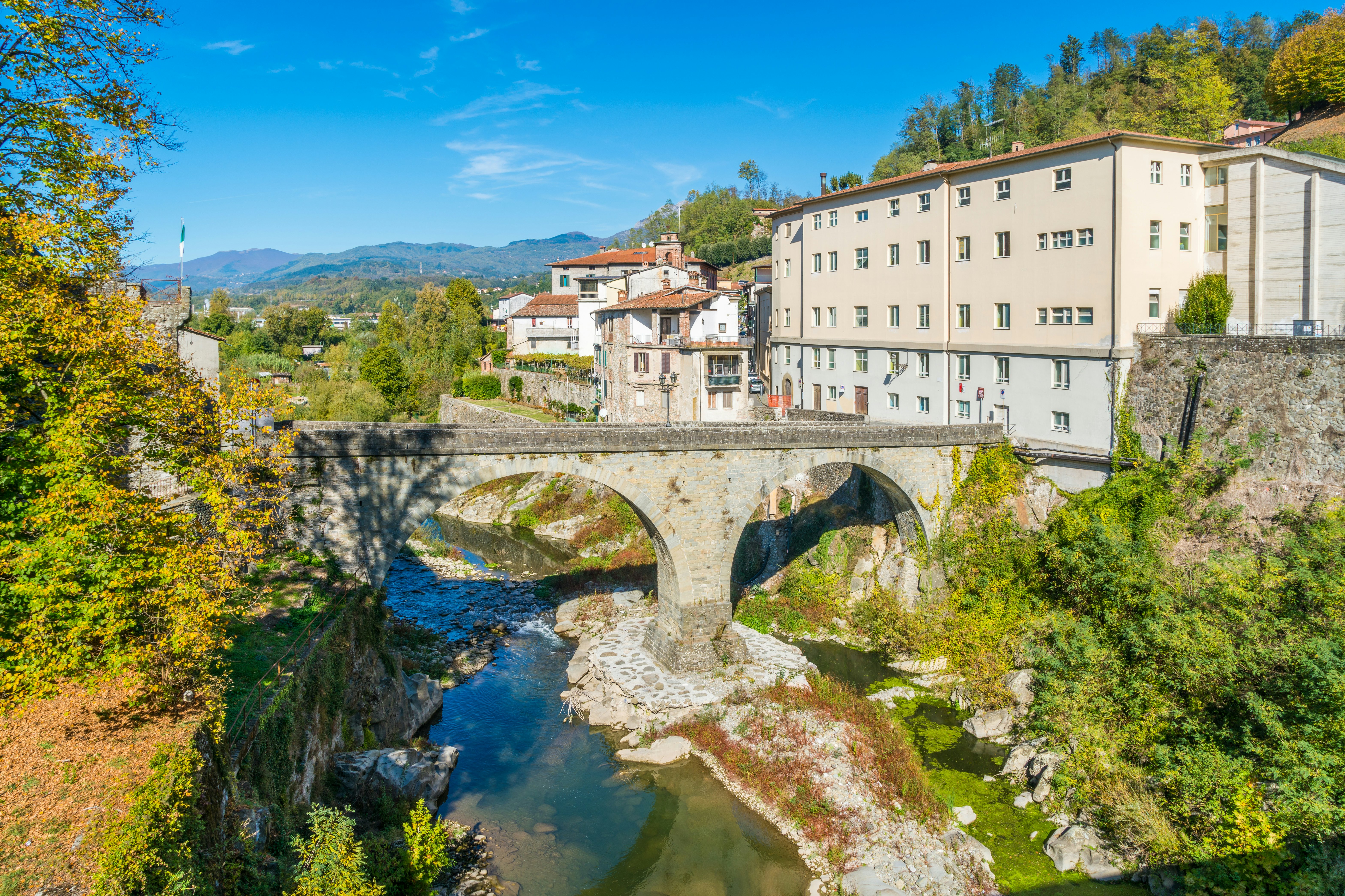Castelnuovo di Garfagnana by the Fiume Serchio river on a sunny day