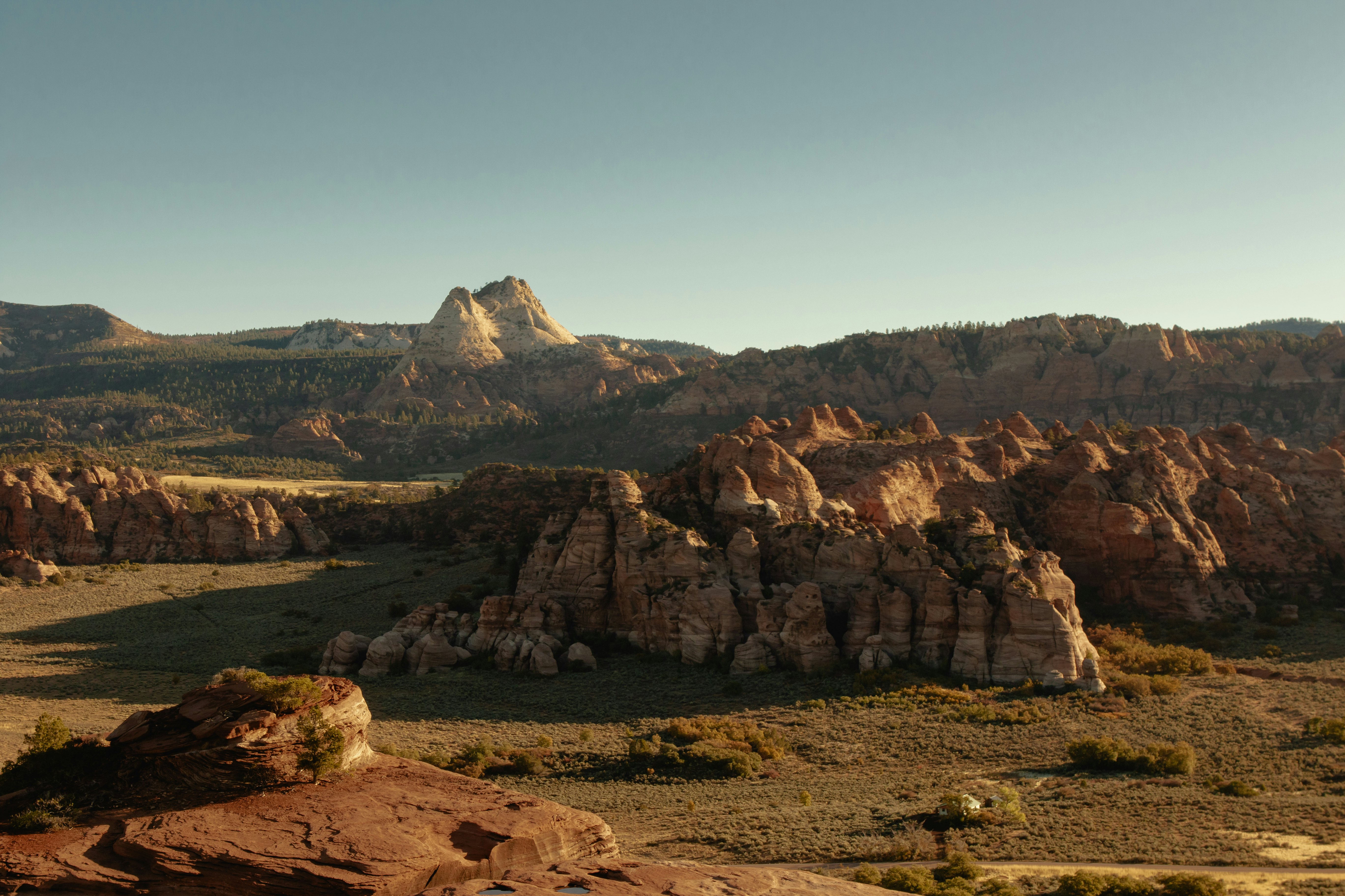 Rocky formations lit by morning sun.