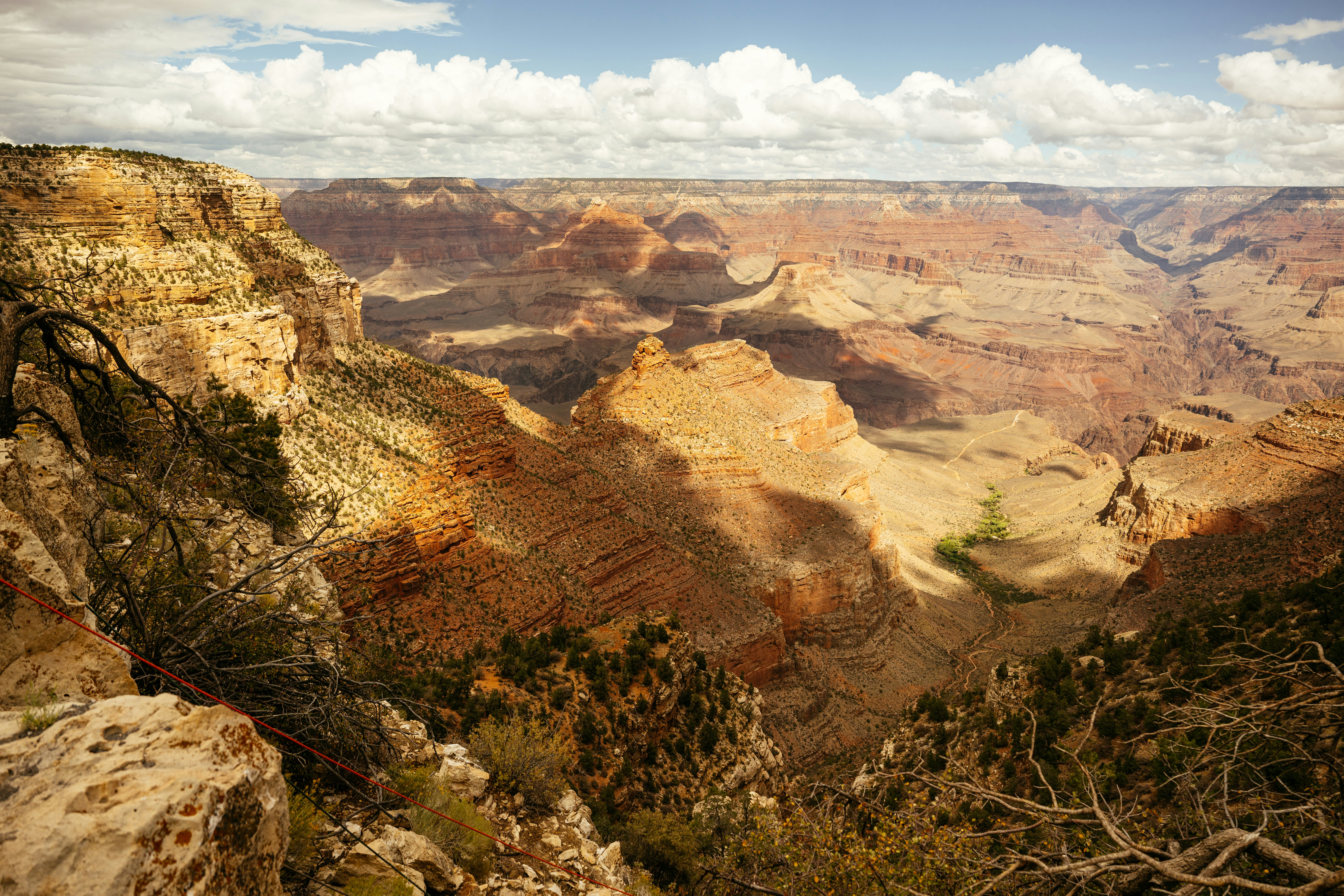 A large canyon with colorful striations.