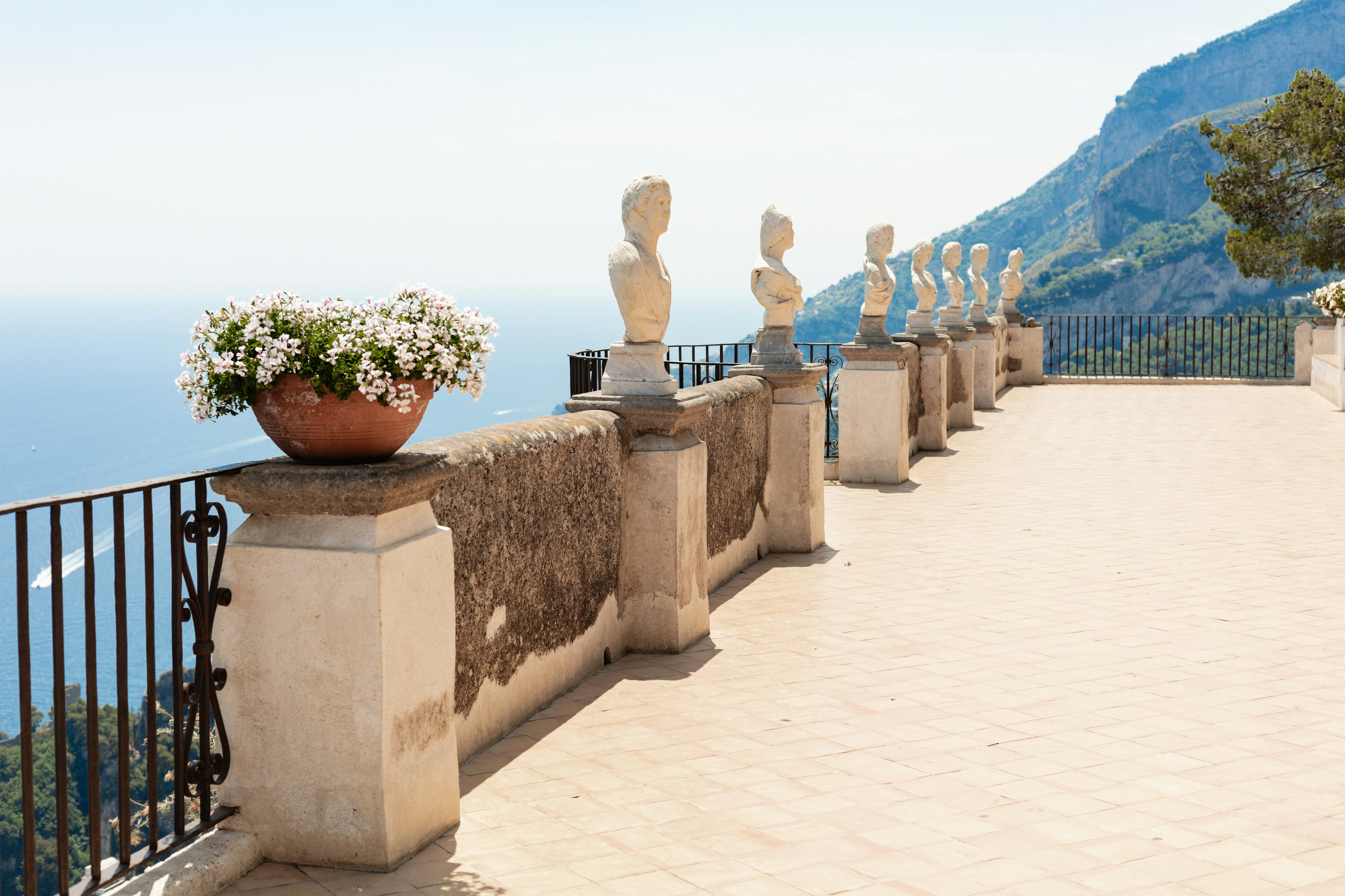 A view of Villa Cimbrone Gardens + Infinity Terrace with the sea beyond, Ravello, Italy. July 2025.