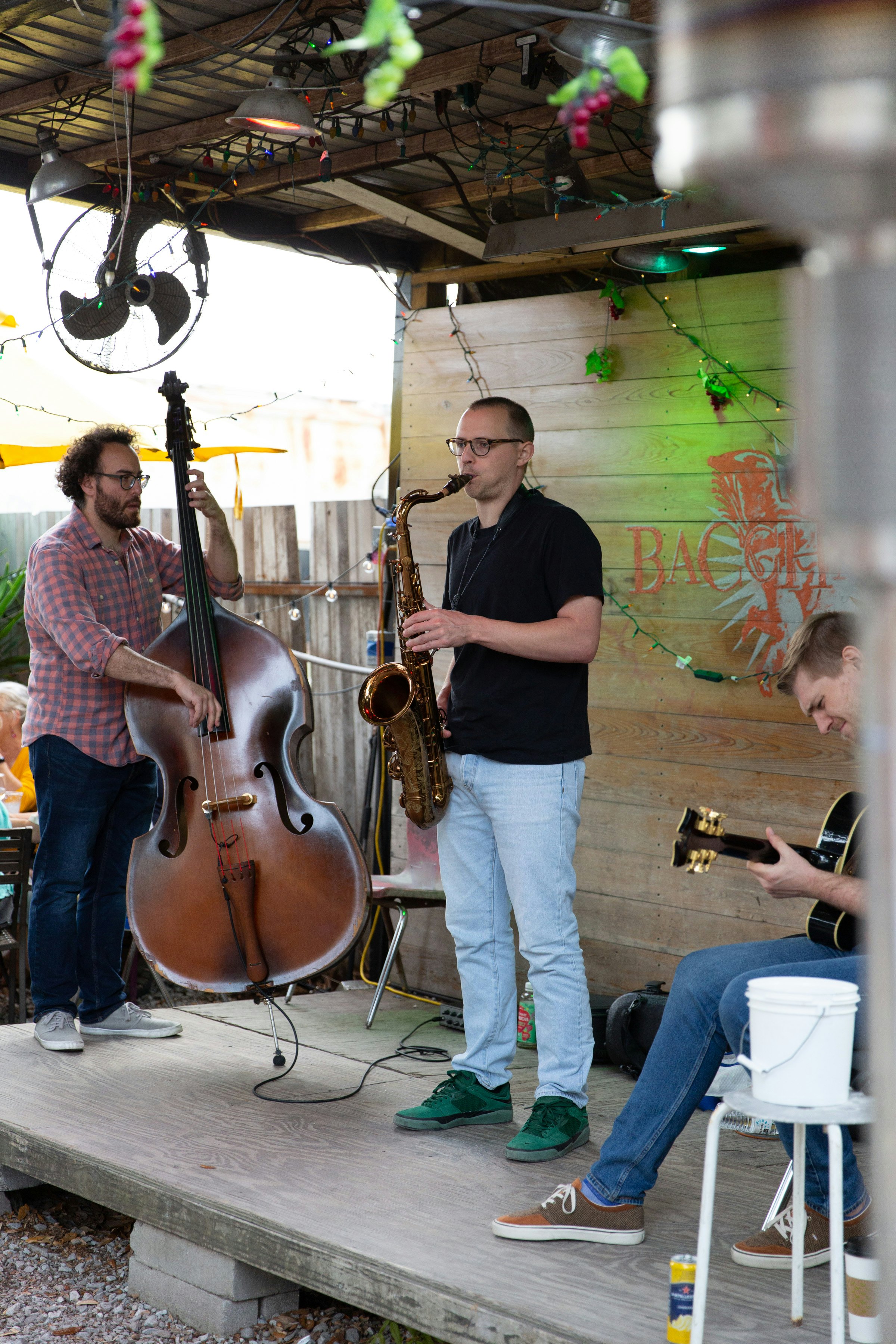 Musicians perform in Bacchanal's courtyard