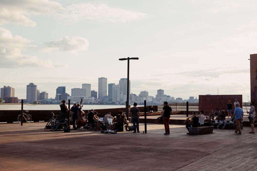 Musicians perform in Crescent Park in the Bywater neighborhood of New Orleans, Louisiana