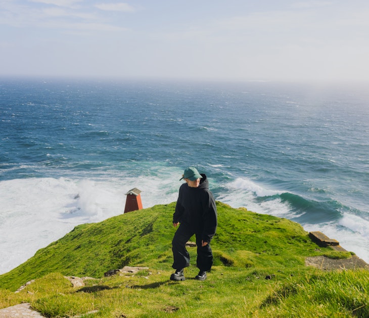 GettyImages-2217673983.jpg
Traveller Hiking with Dramatic Mountain and Ocean Views on Faroe Islands