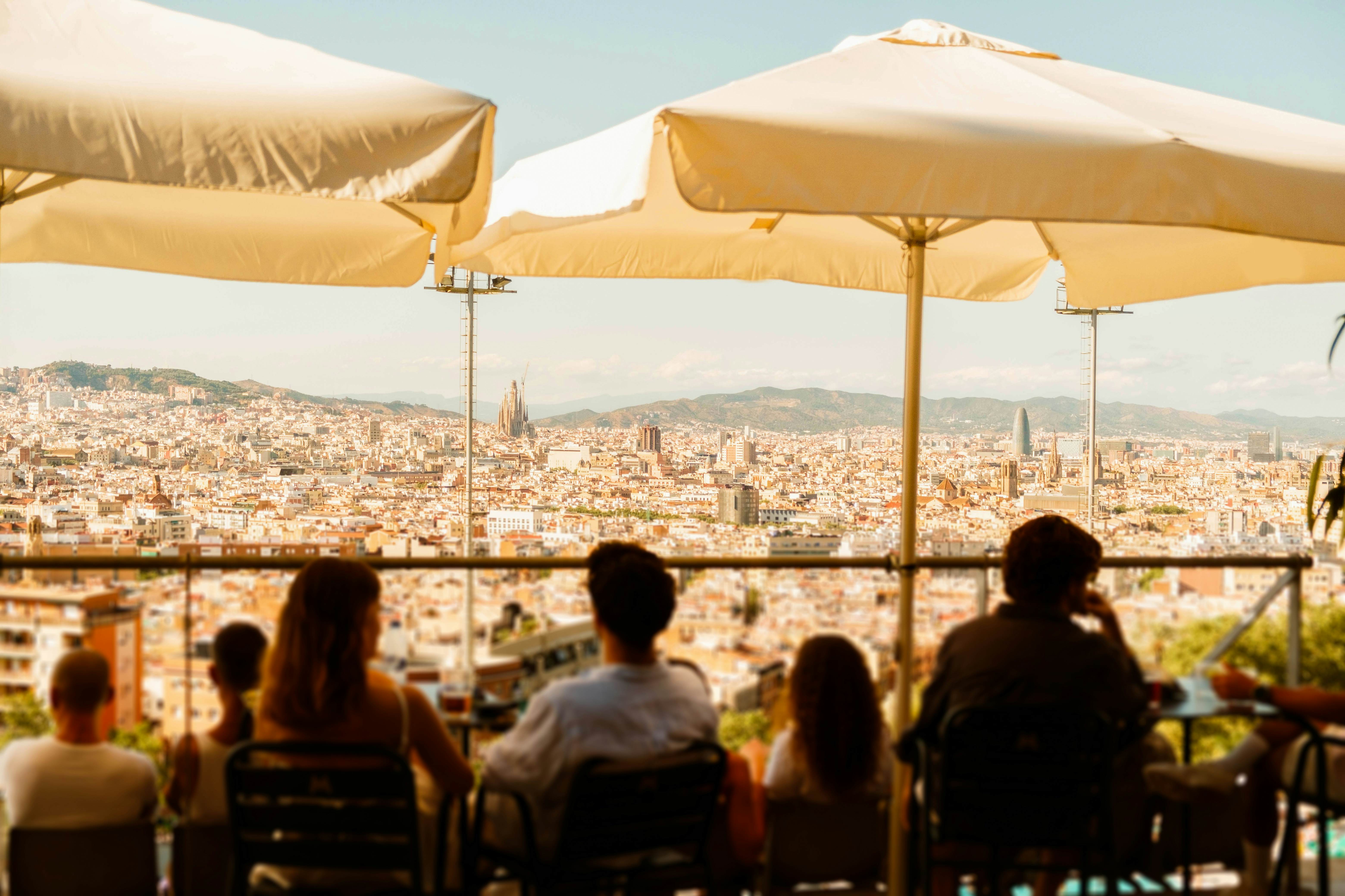 GettyImages-2225047162.jpg
People gathering at sunset enjoying a drink contemplating the Barcelona city with the Sagrada Familia view
