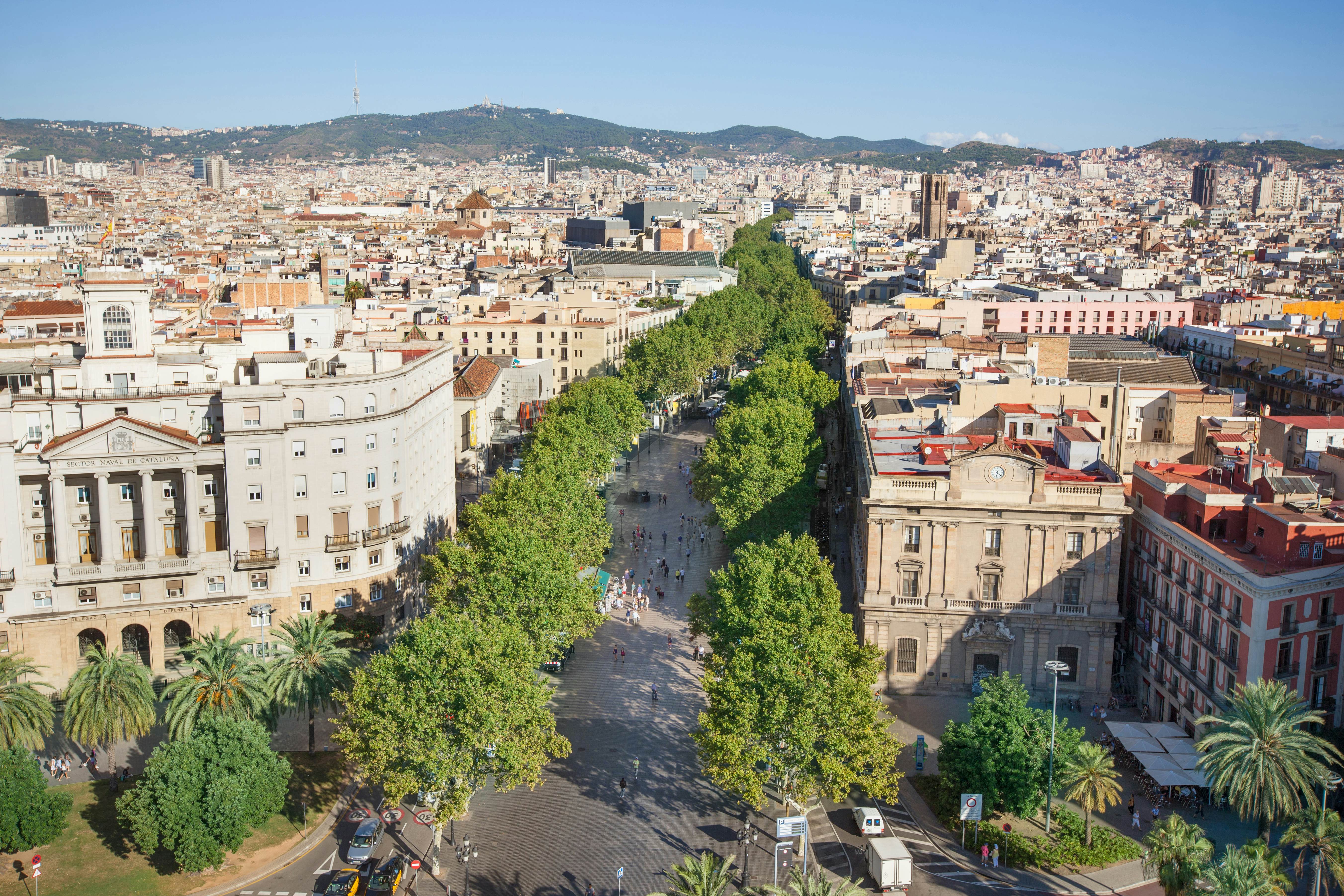 Built Structure Cityscape Architecture Road Travel Destinations Horizontal Panoramic Outdoors High Angle View Spain Tree Mountain Day Barcelona Province Barcelona - Spain Color Image Treelined The Ramblas City Life Incidental People Building Exterior Photography Residential Building Clear Sky
Panoramic of Barcelona with Las Ramblas in the center.