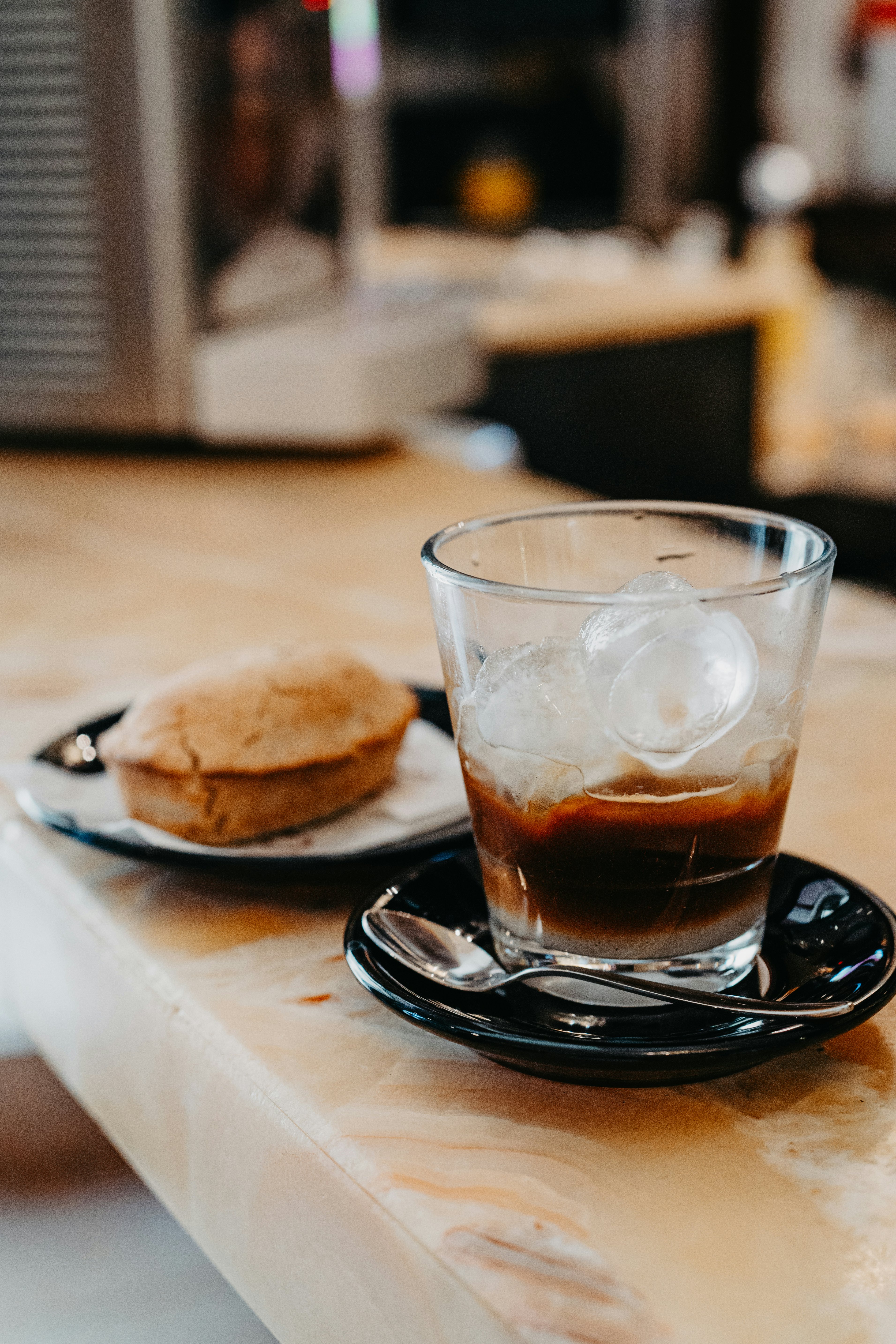 Caffe Leccese (iced coffe with almond sirup) and Pasticciotto - Caffè Alvino. August 2024: Lecce, Puglia, Italy