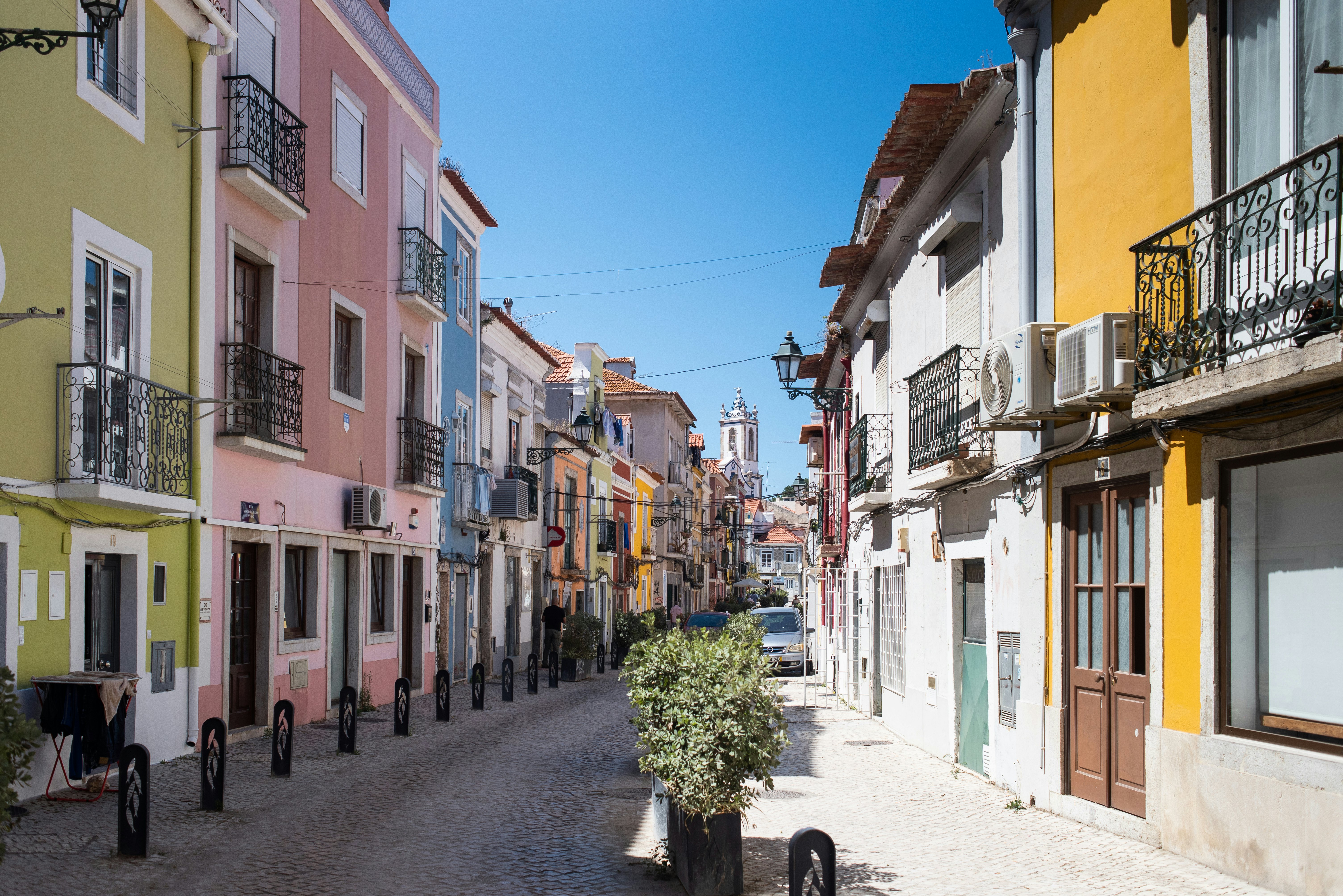 Colorful buildings on a narrow stone street