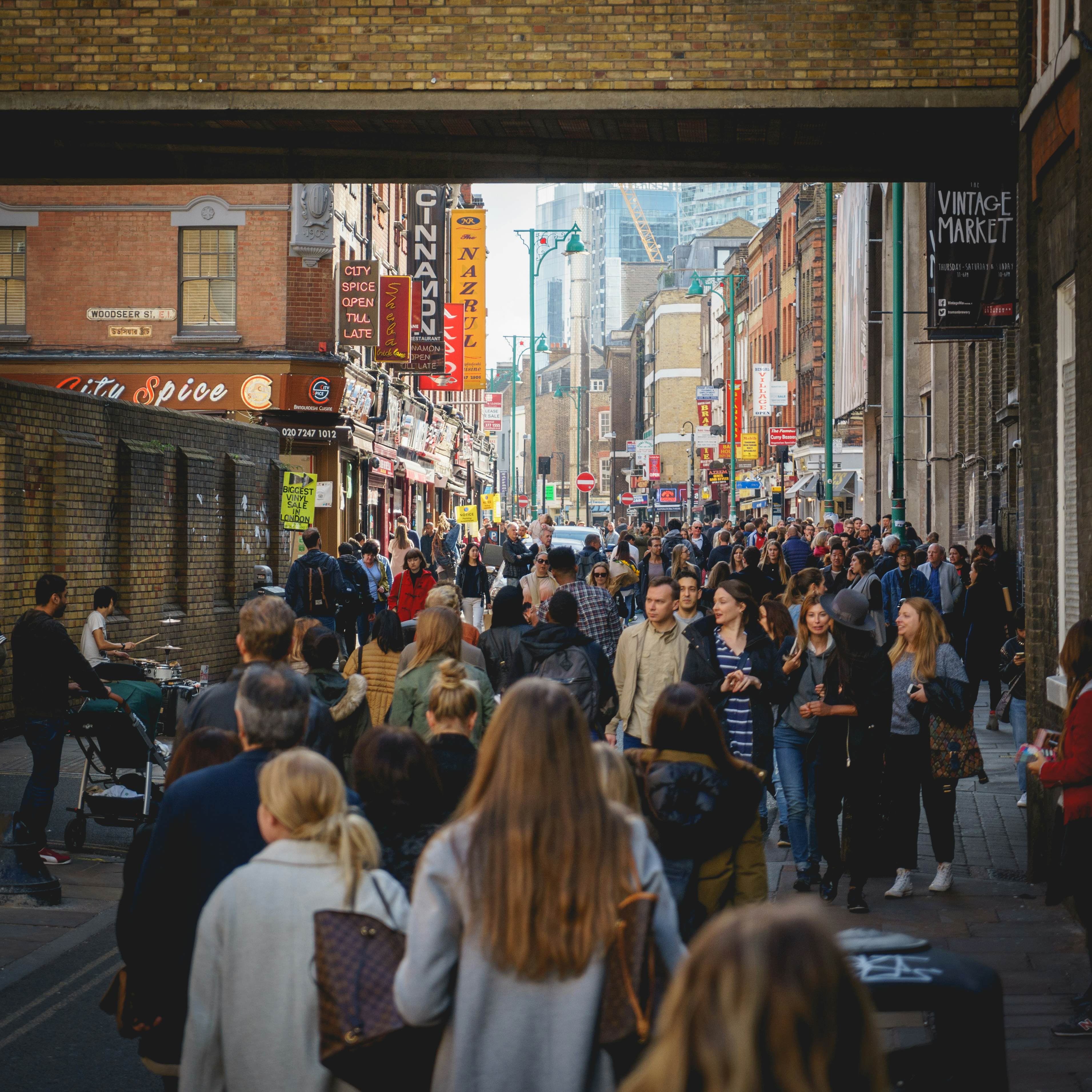 Brick Lane crowded of people.
