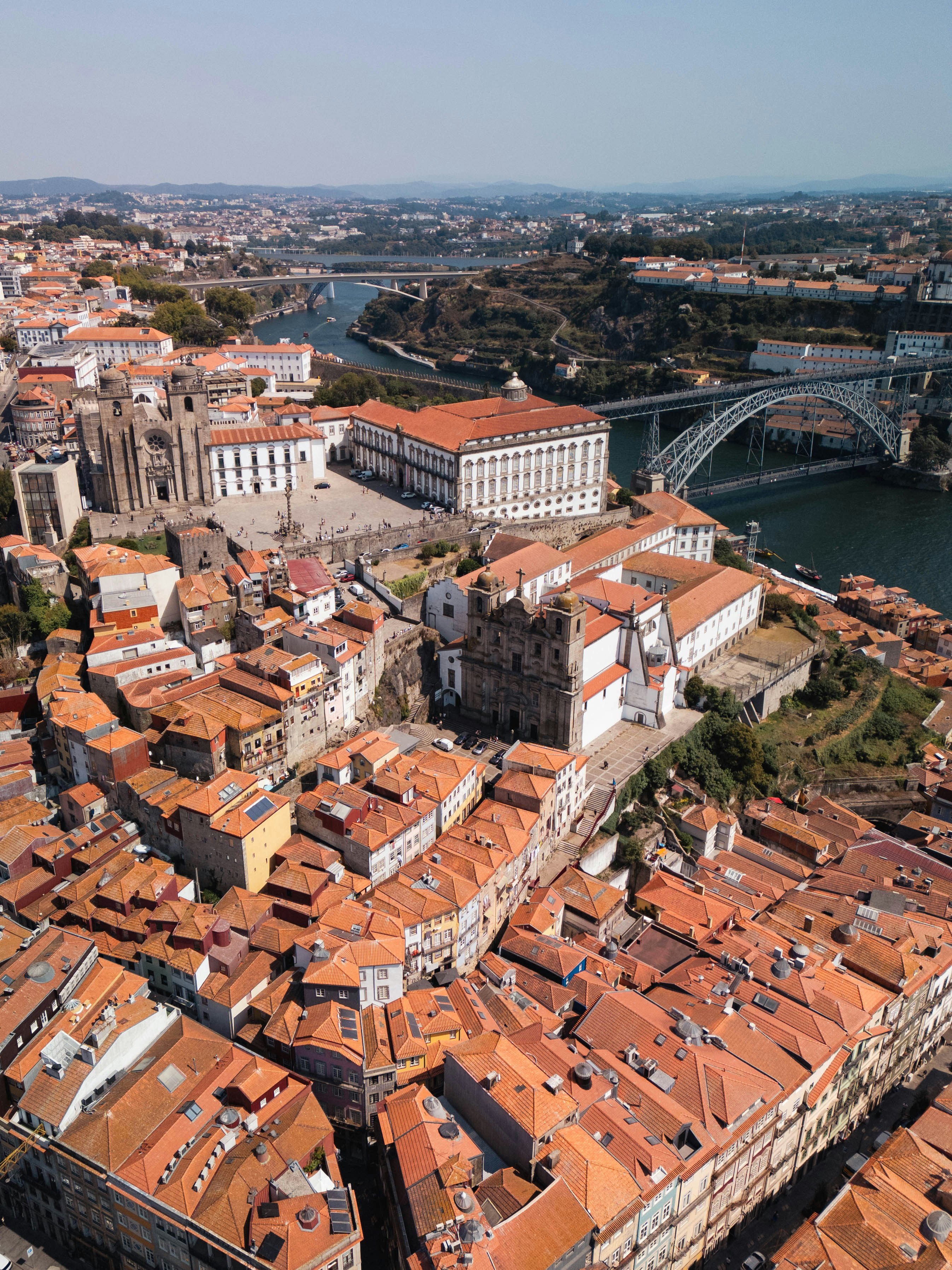 The Dom Luis I Bridge amidst the orange roofs of Porto