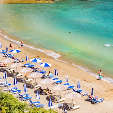 Bali, Greece - May 4, 2016: Sandy beach Varkotopos in sea bay of resort village Bali. Views of shore, washed by waves with sun loungers and parasols where sunbathing and swim tourists. Crete, Greece, License Type: media, Download Time: 2024-11-29T08:58:49.000Z, User: pinkjozie64, Editorial: true, purchase_order: 56530 - Guidebooks, job: Global Publishing WIP, client: CRETE 9, other: JO-ANNE RIDDELL