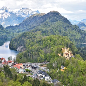 Schwangau, Germany - May 2019. Neuschwanstein Castle. Neuschwanstein Schwangau castle with scenic mountain landscape near Fussen, southwest Bavaria, Germany. tourist attraction, famous place, License Type: media, Download Time: 2026-02-24T00:42:57.000Z, User: bhealy950, Editorial: true, purchase_order: 65050 - Digital Destinations and Articles, job: Lonely Planet Online Editorial, client: Best road trips in Germany, other: Brian Healy