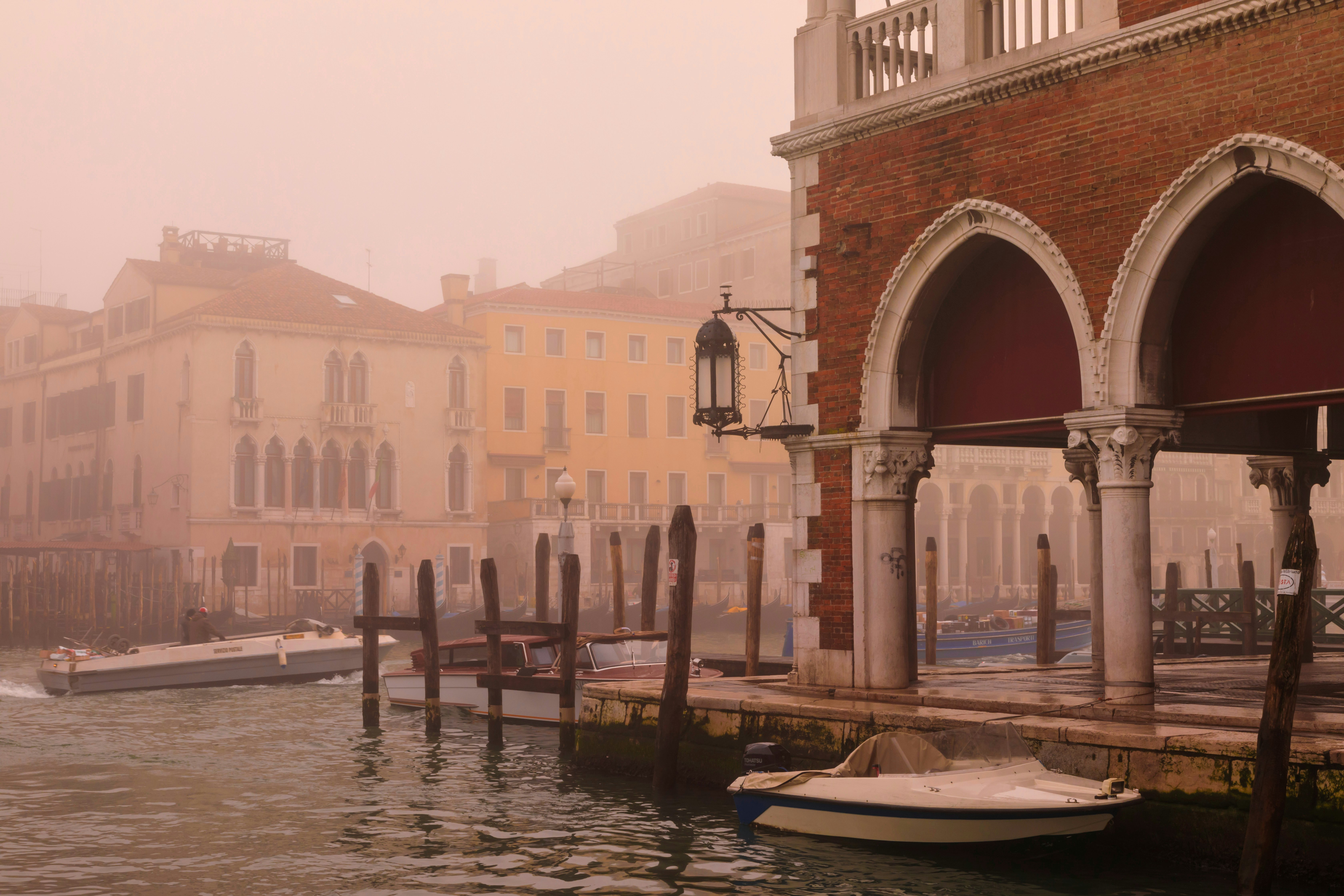 Venetian Winter fog hangs eerily over the Grand Canal and historic Rialto Market, an ethereal scene at Carnival time, February, UNESCO World Heritage Site, San Polo, Venice, Veneto, Italy