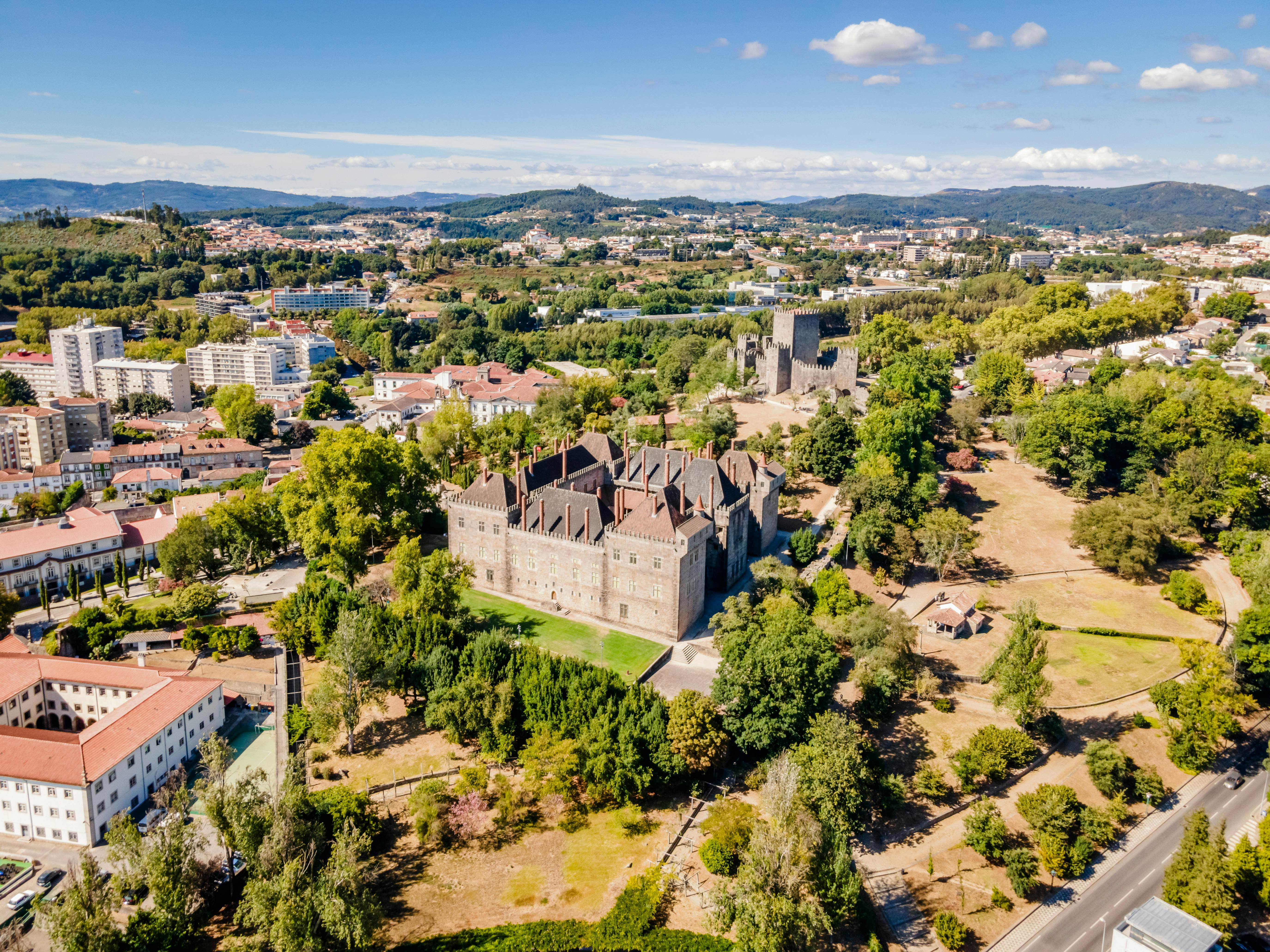 Aerial view of palace of dukes of Braganza and Castle in Guimaraes, Portugal, License Type: media, Download Time: 2025-11-11T14:30:21.000Z, User: LP_YKhanna, Editorial: false, purchase_order: 65050 - Digital Destinations and Articles, job: LP, client: App Content, other: Yuvraj Khanna