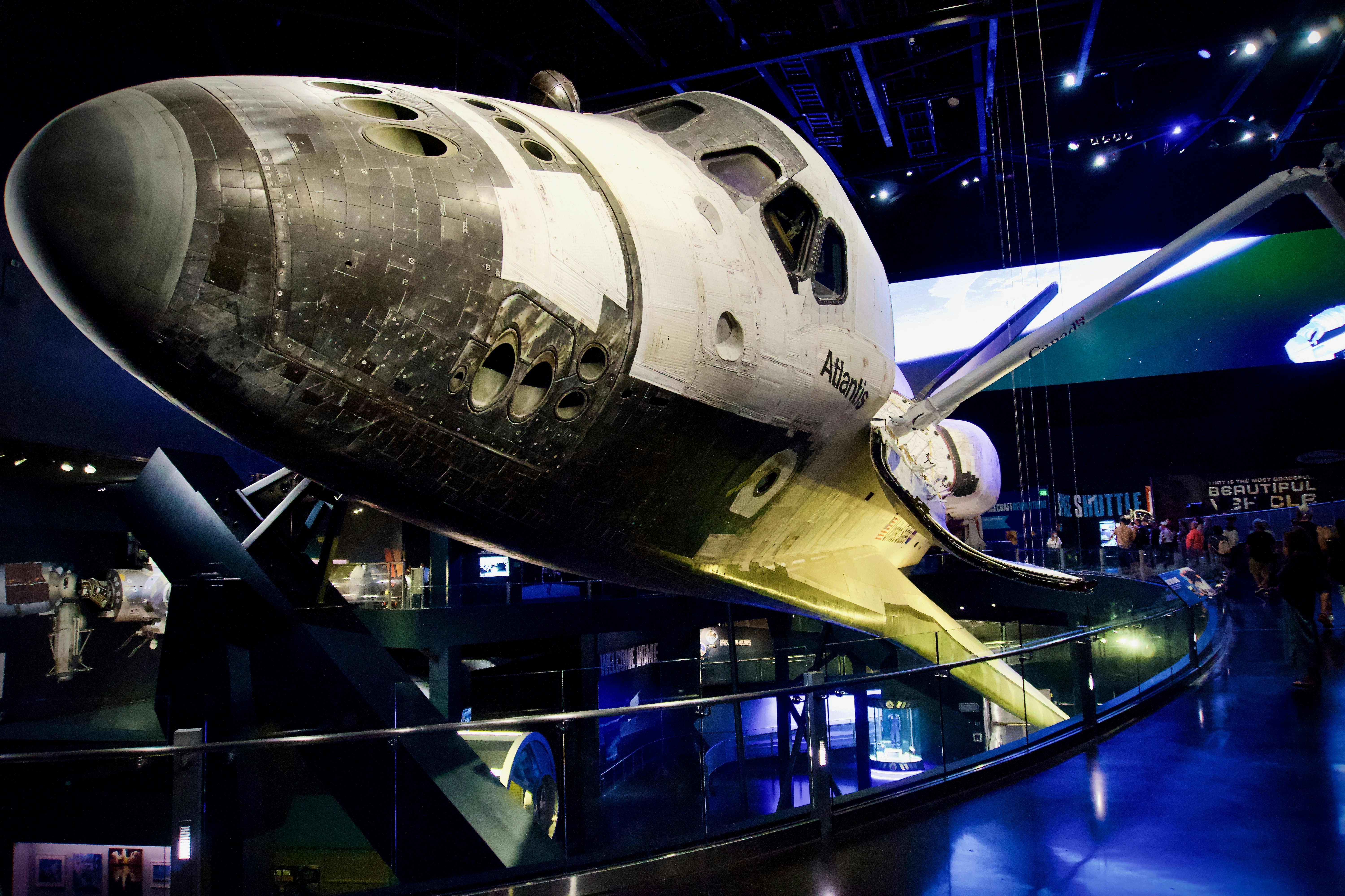 A space shuttle installed in a museum gallery.
