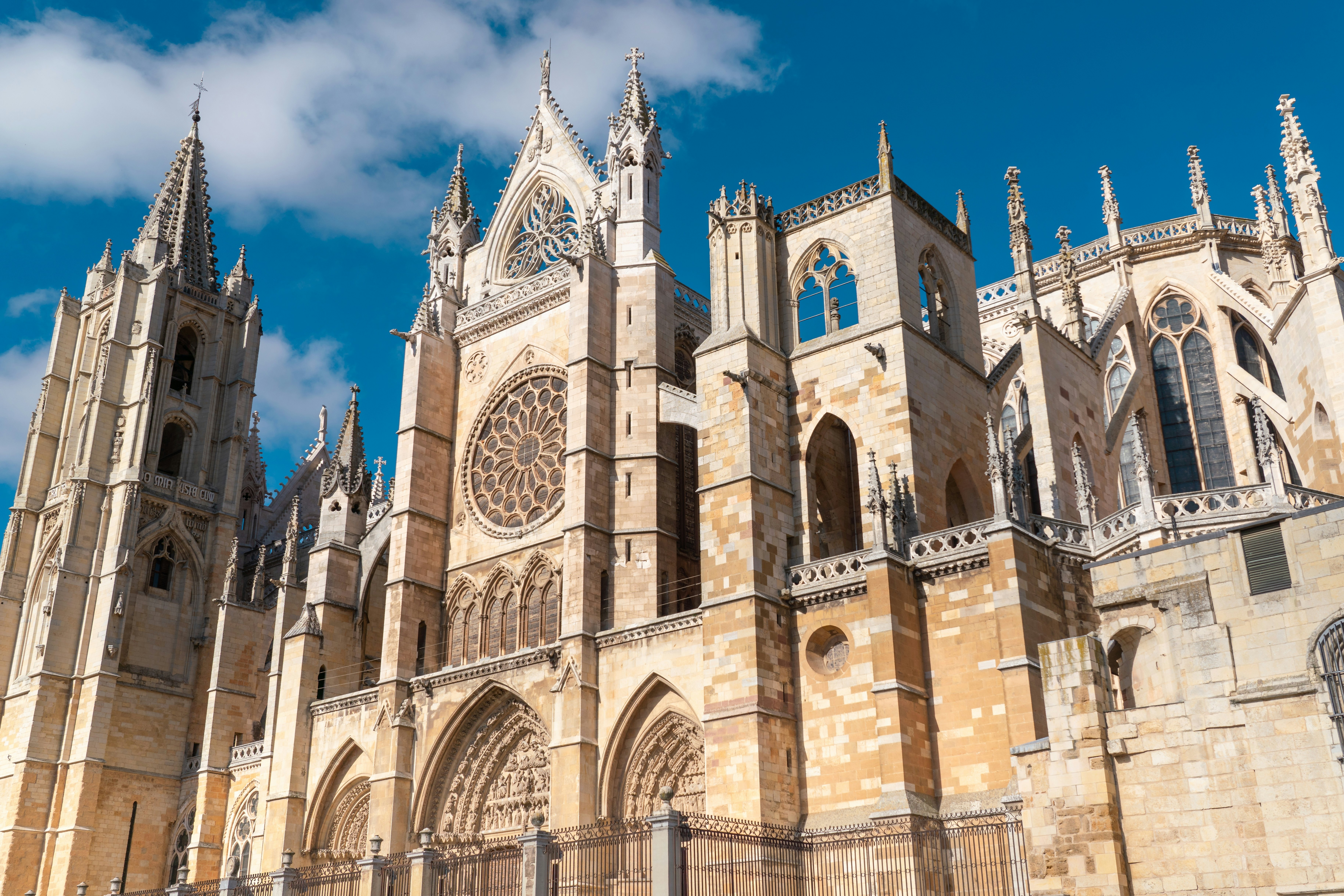 A Gothic cathedral with spires, towers, buttresses and stained glass windows.