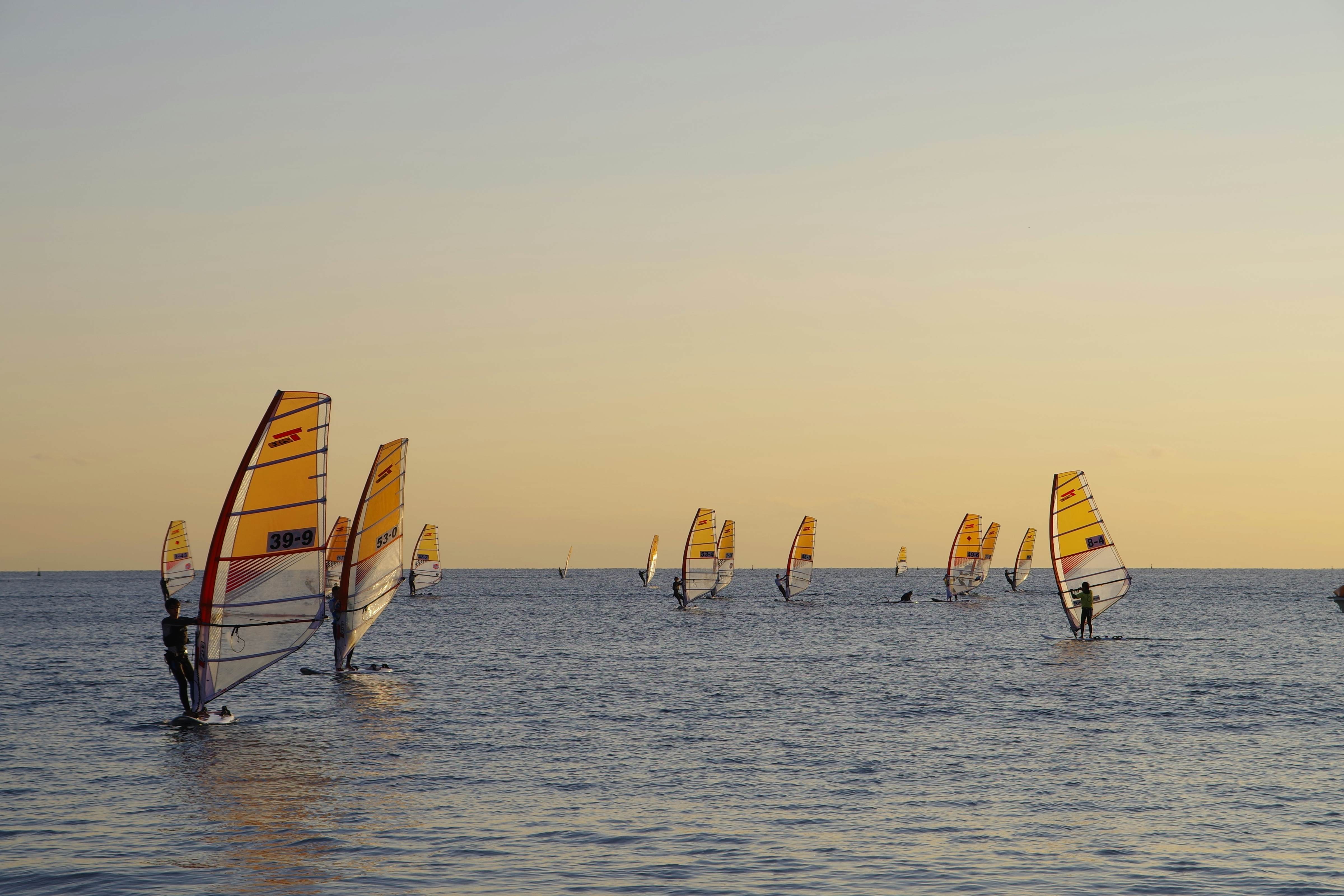 Kamakura, Japan - December 6, 2020: Windsurfing as the Sun Sets at Yuigahama Beach, Kamakura, Kanagawa Prefecture, Japan, License Type: media, Download Time: 2025-05-12T14:43:32.000Z, User: aniabartoszek, Editorial: true, purchase_order: 56530 - Guidebooks, job: Global Publishing-WIP, client: Best Bike Rides Japan 1, other: Ania Lenihan