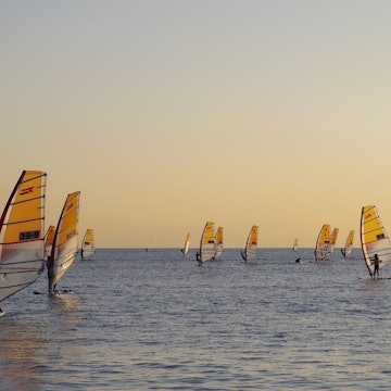 Kamakura, Japan - December 6, 2020: Windsurfing as the Sun Sets at Yuigahama Beach, Kamakura, Kanagawa Prefecture, Japan, License Type: media, Download Time: 2025-05-12T14:43:32.000Z, User: aniabartoszek, Editorial: true, purchase_order: 56530 - Guidebooks, job: Global Publishing-WIP, client: Best Bike Rides Japan 1, other: Ania Lenihan