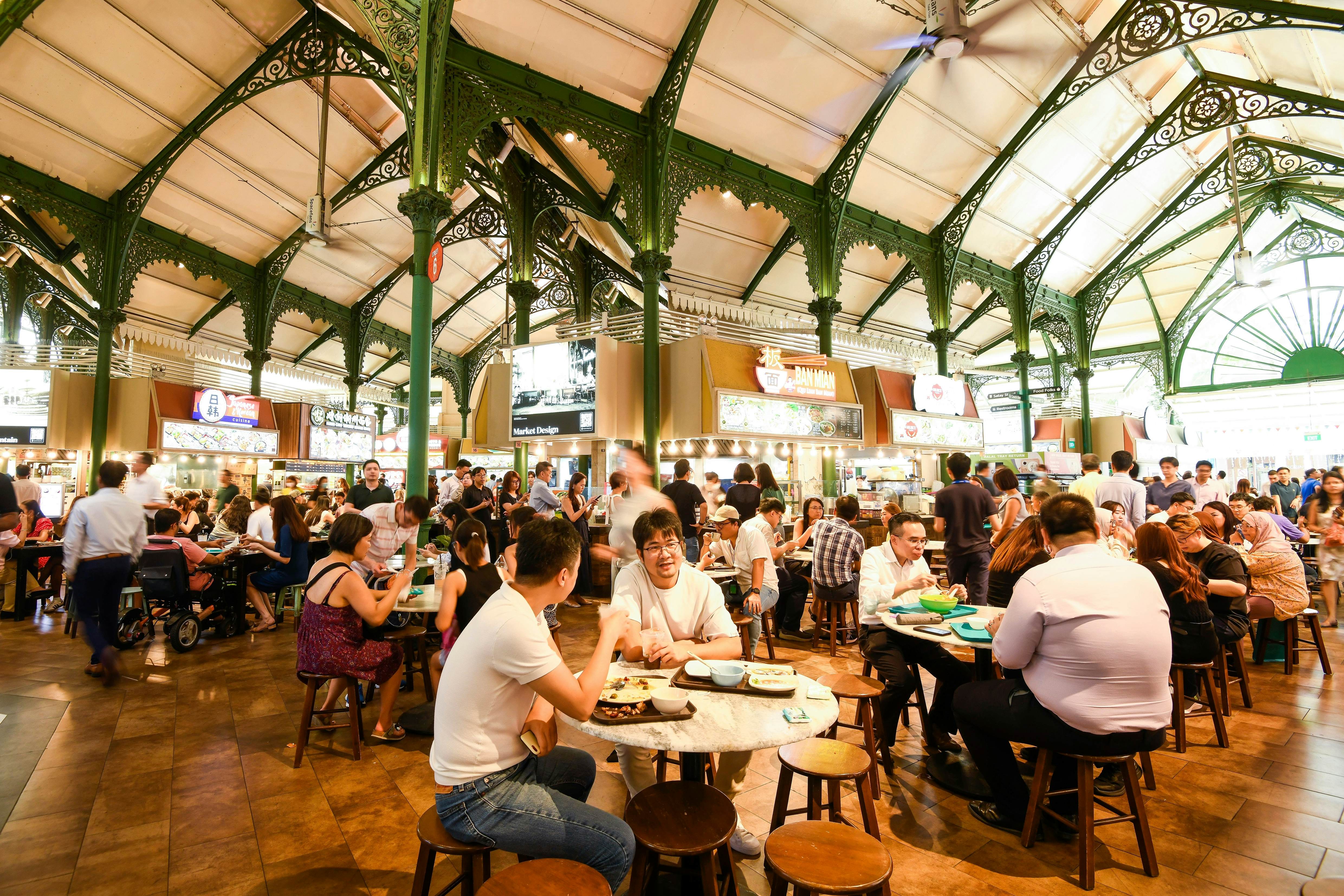 Singapore- July 11, 2024: View of people dining in the Lau Pa Sat hawker market in Singapore, it was one of the oldest Victorian structures in Southeast Asia., License Type: media, Download Time: 2025-05-29T14:37:34.000Z, User: lonelyplanetmedia, Editorial: true, purchase_order: 65050 - Digital Destinations and Articles, job: Global Publishing WIP, client: Global Publishing WIP, other: Peterson Haggarty // SS Comp Ingestion