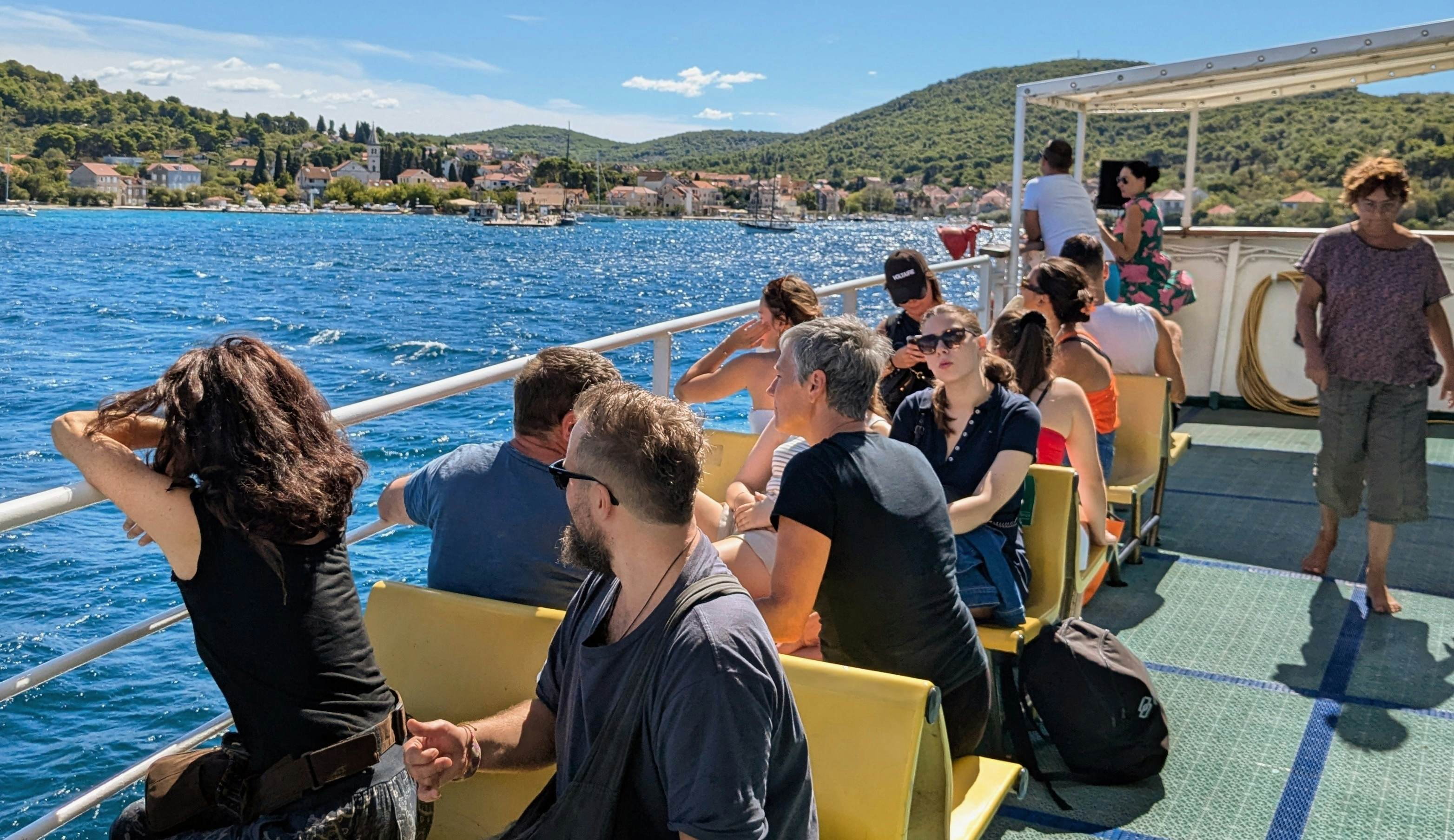 Šibenik archipelago, Croatia 10th September 2024 - passengers on the deck of a ferry watching as it approaches Zlarin island , License Type: media, Download Time: 2026-02-07T20:05:48.000Z, User: bhealy950, Editorial: true, purchase_order: 65050 - Digital Destinations and Articles, job: Lonely Planet Online Editorial, client: Getting around Croatia, other: Brian Healy