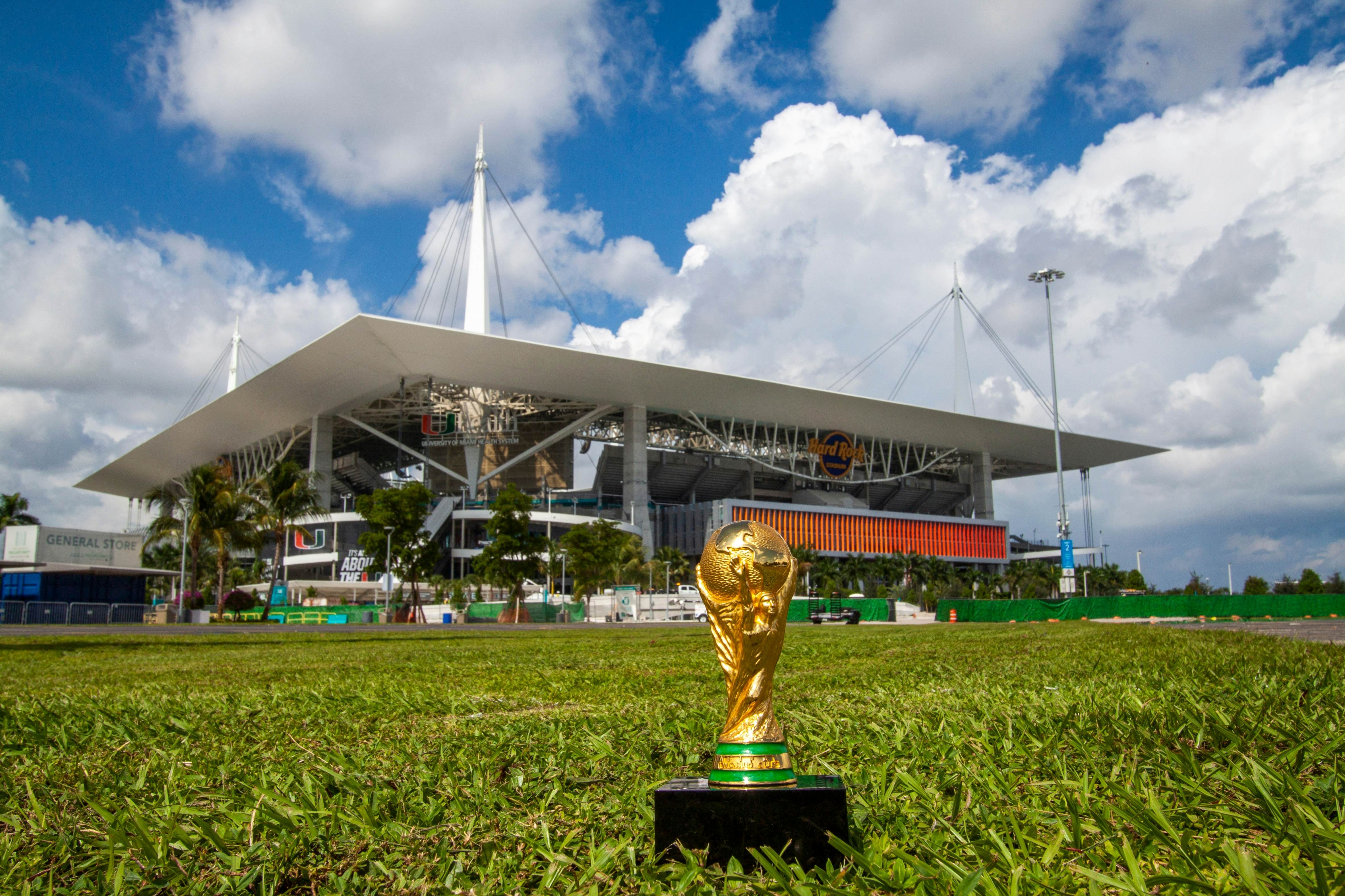 THE USA, Miami, 16 October 2019: World Cup FIFA on background Hard Rock Stadium which will host the 2026 World Cup games. FIFA  World cup of football will takes in North America and South America , License Type: media, Download Time: 2026-02-09T12:01:59.000Z, User: clairenaylor, Editorial: true, purchase_order: 65050 - Digital Destinations and Articles, job: Online editorial, client: World Cup guide, other: Claire Naylor