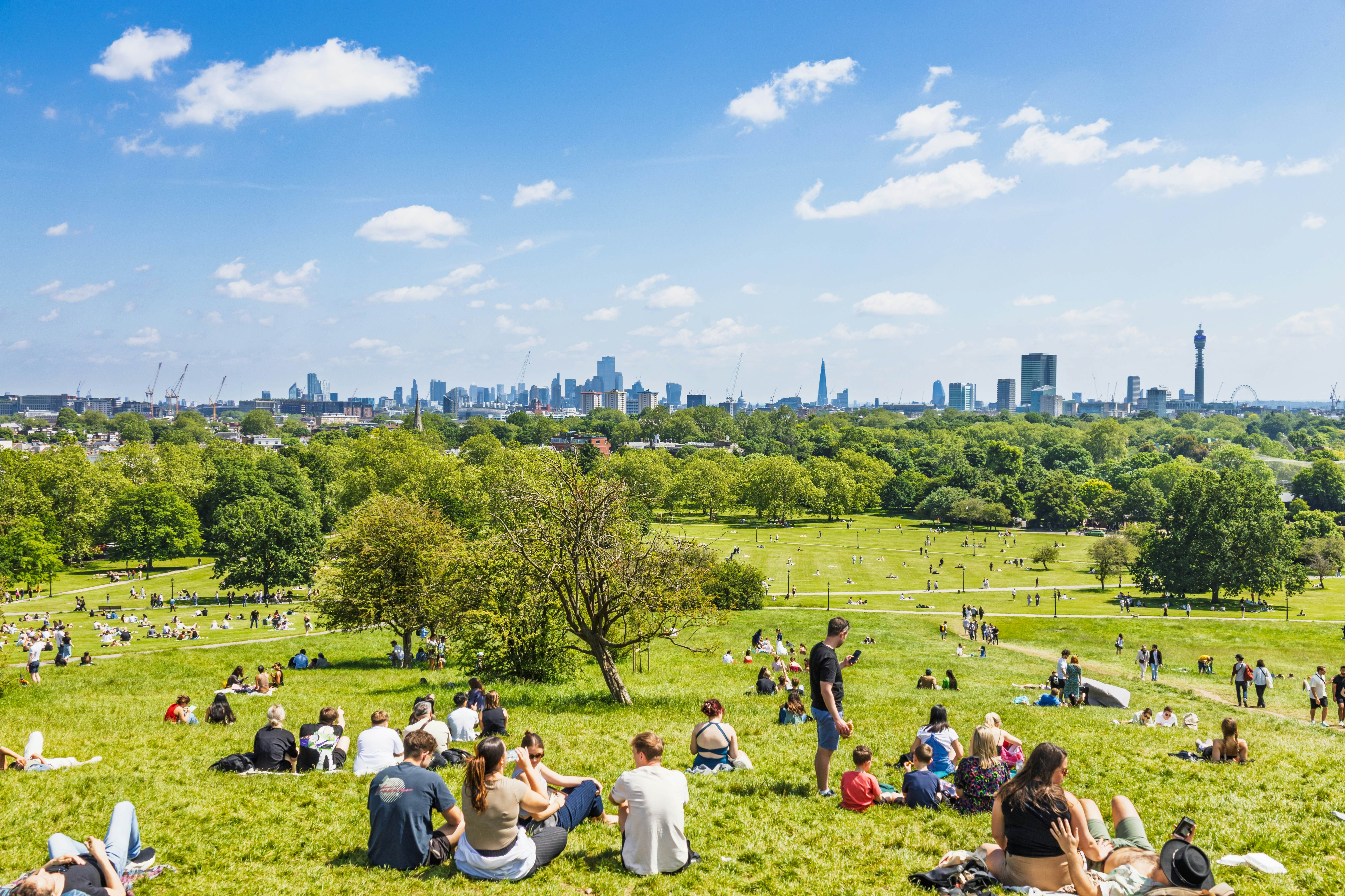 Crowds relaxing on Primrose Hill overlooking skyline from Regents Park. London, UK, 2 June 2024, License Type: media, Download Time: 2026-02-16T12:29:29.000Z, User: clairenaylor, Editorial: true, purchase_order: 65050 - Digital Destinations and Articles, job: Online editorial, client: London best time, other: Claire Naylor