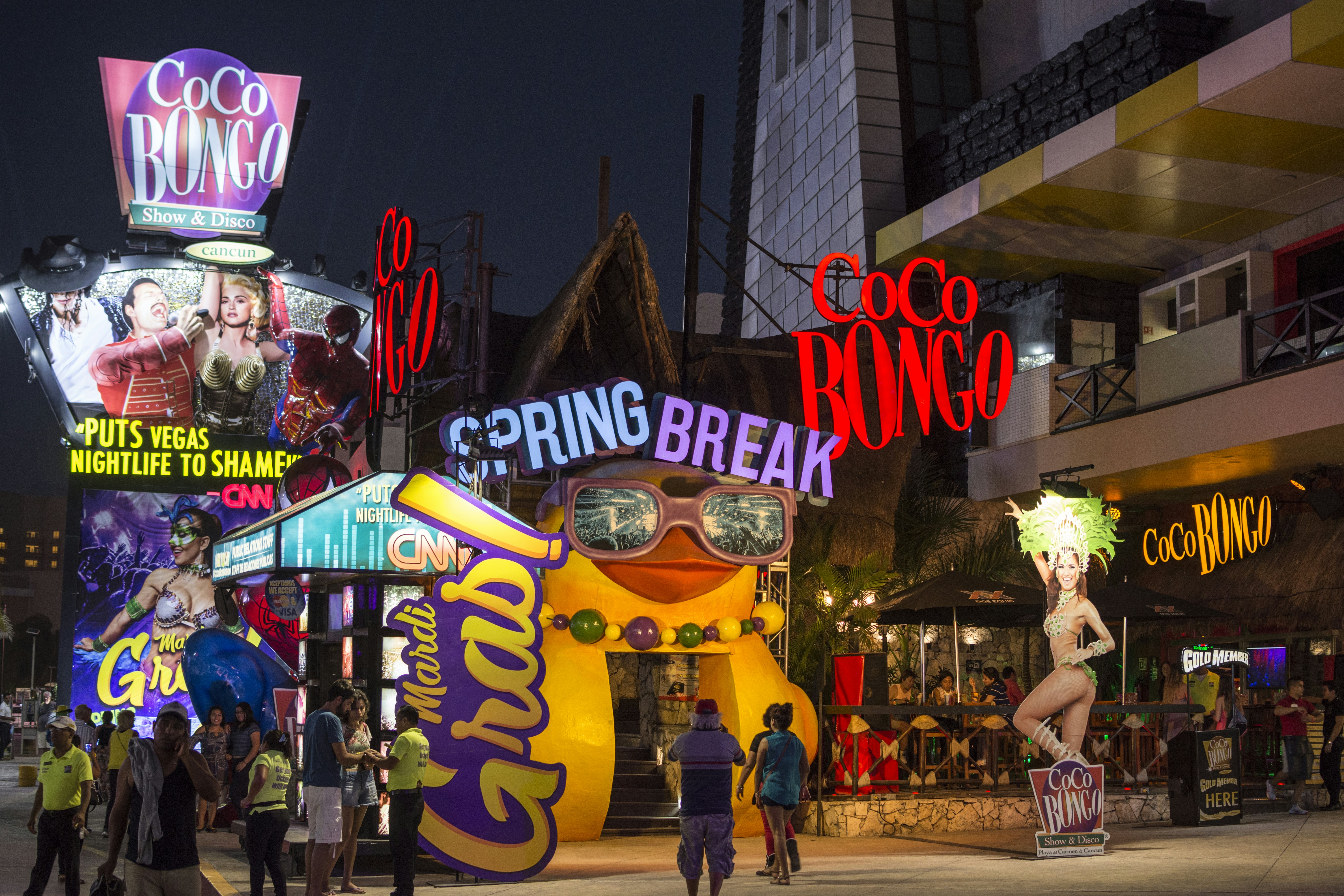 Cancún's premiere nightclub, Coco Bongo lights up the night with colorful displays promoting Spring break.,