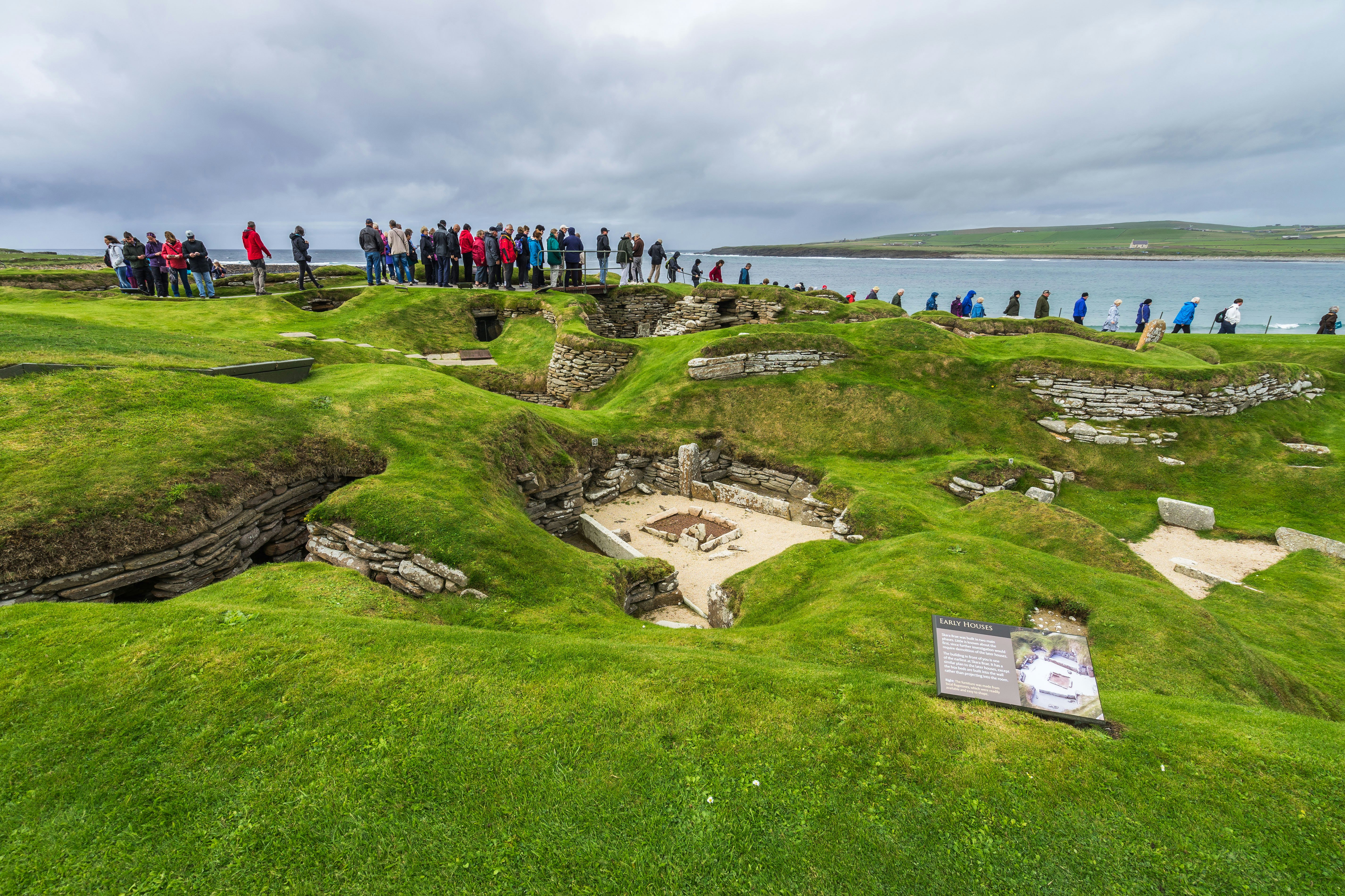 Visitors at Skara Brae, one of the oldest Neolithic settlement in the world.