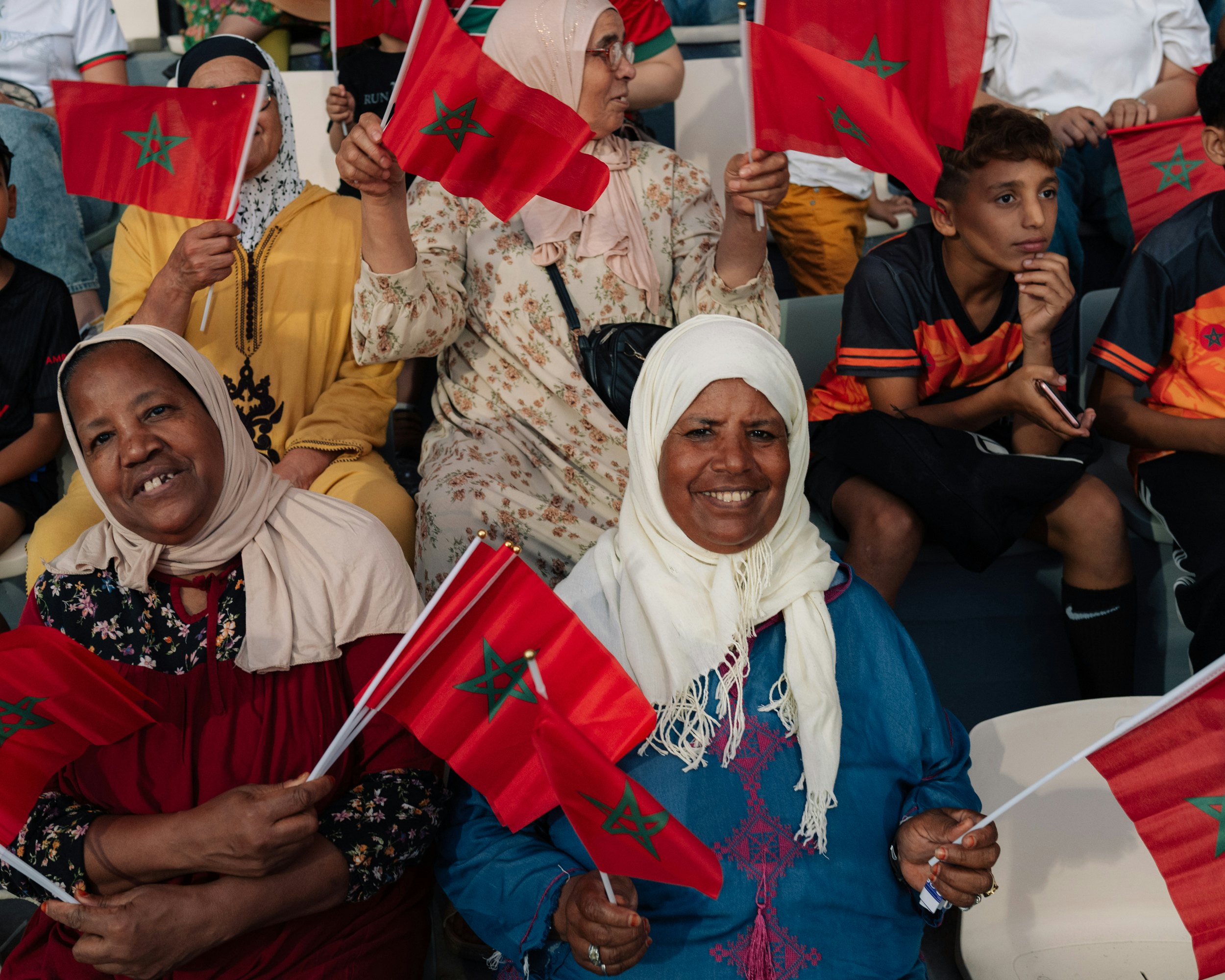 Moroccan fans pose for a photo at the opening match of the 2024 Women’s Africa Cup of Nations in Rabat, Morocco.