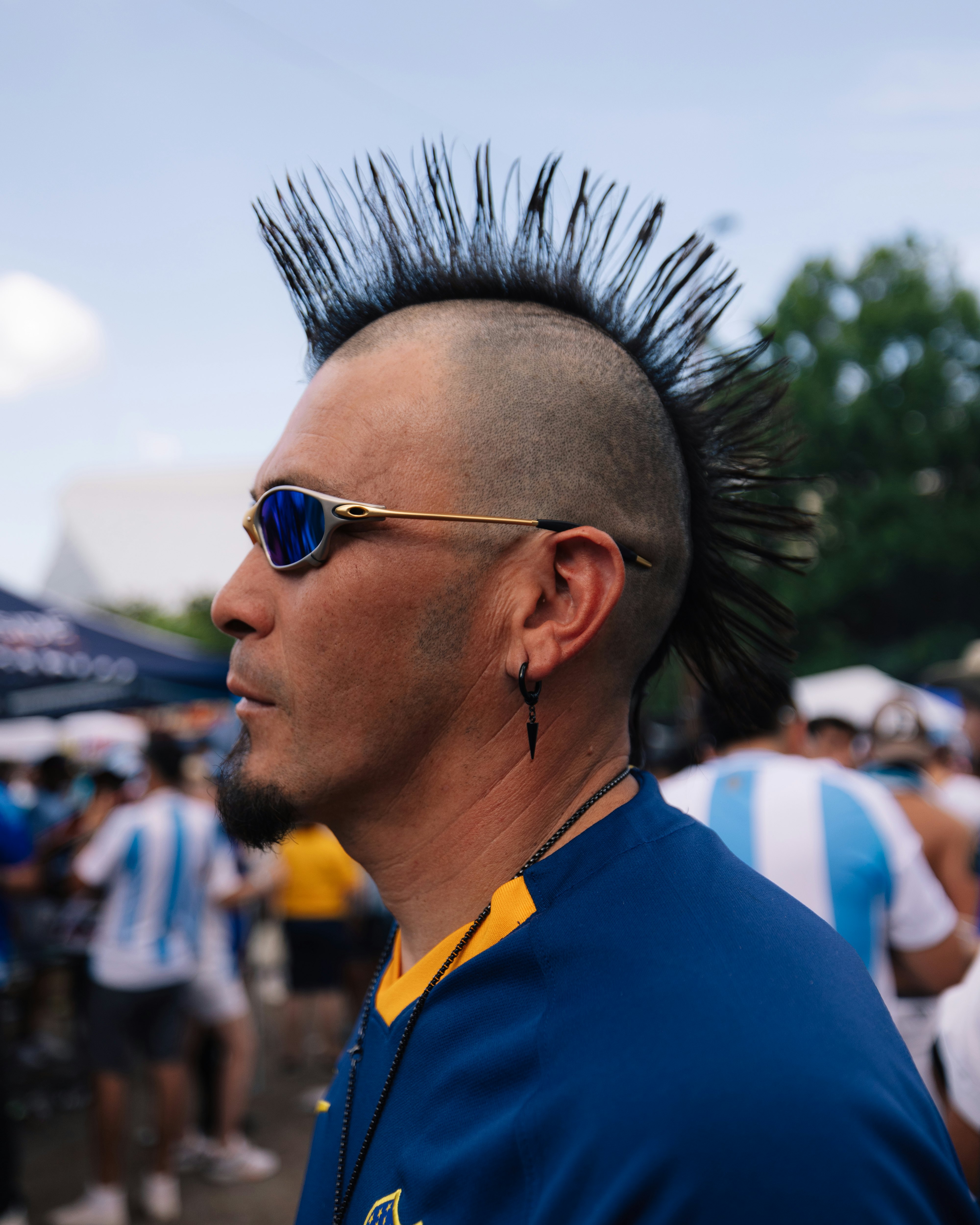 Argentinian fan with a mohawk haircut at the 2024 Copa America opening match between Argentina and Canada in Atlanta, Georgia.