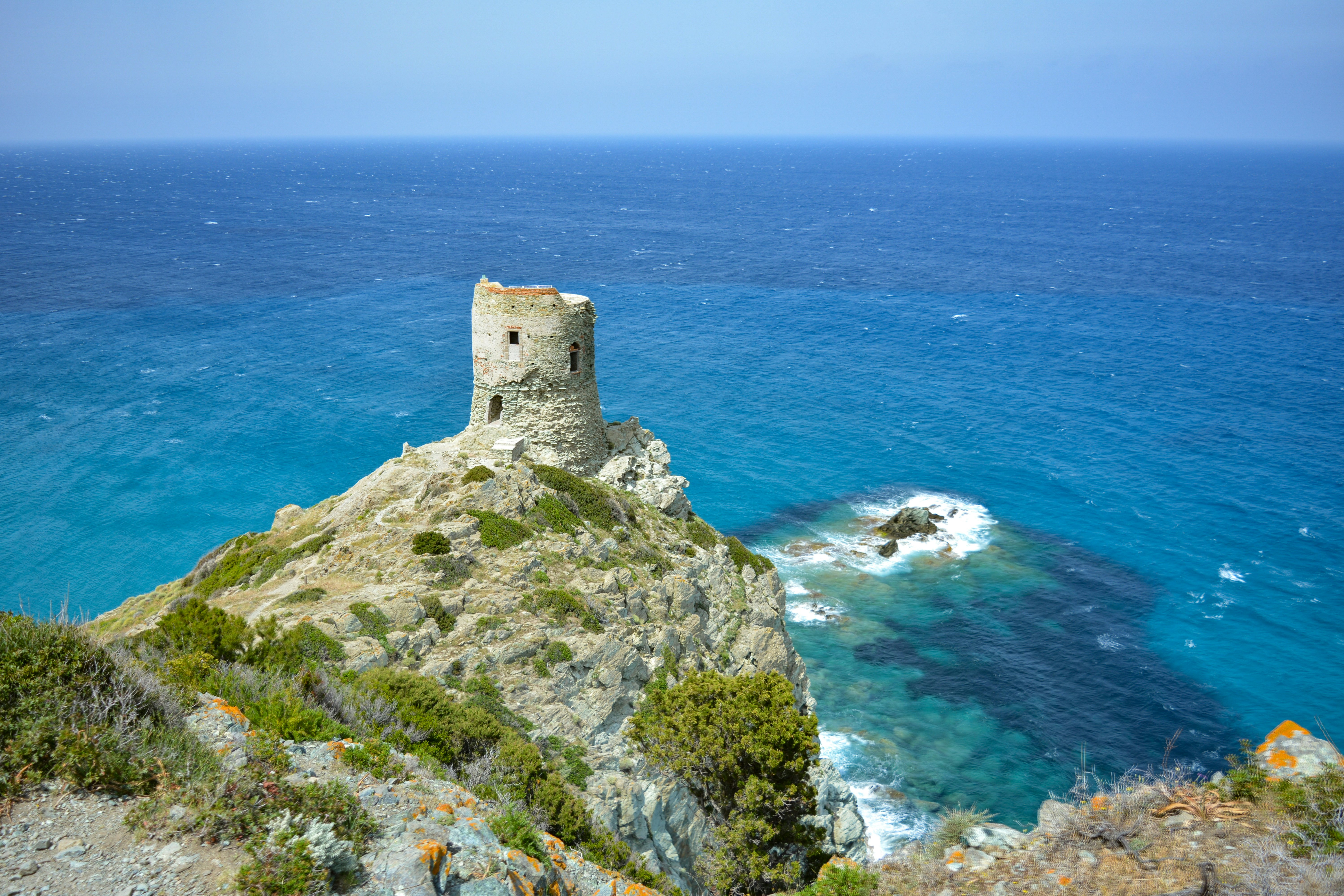 The Tower of Agnellu on the Sentier des Douaniers walking trail in Corsica, France.