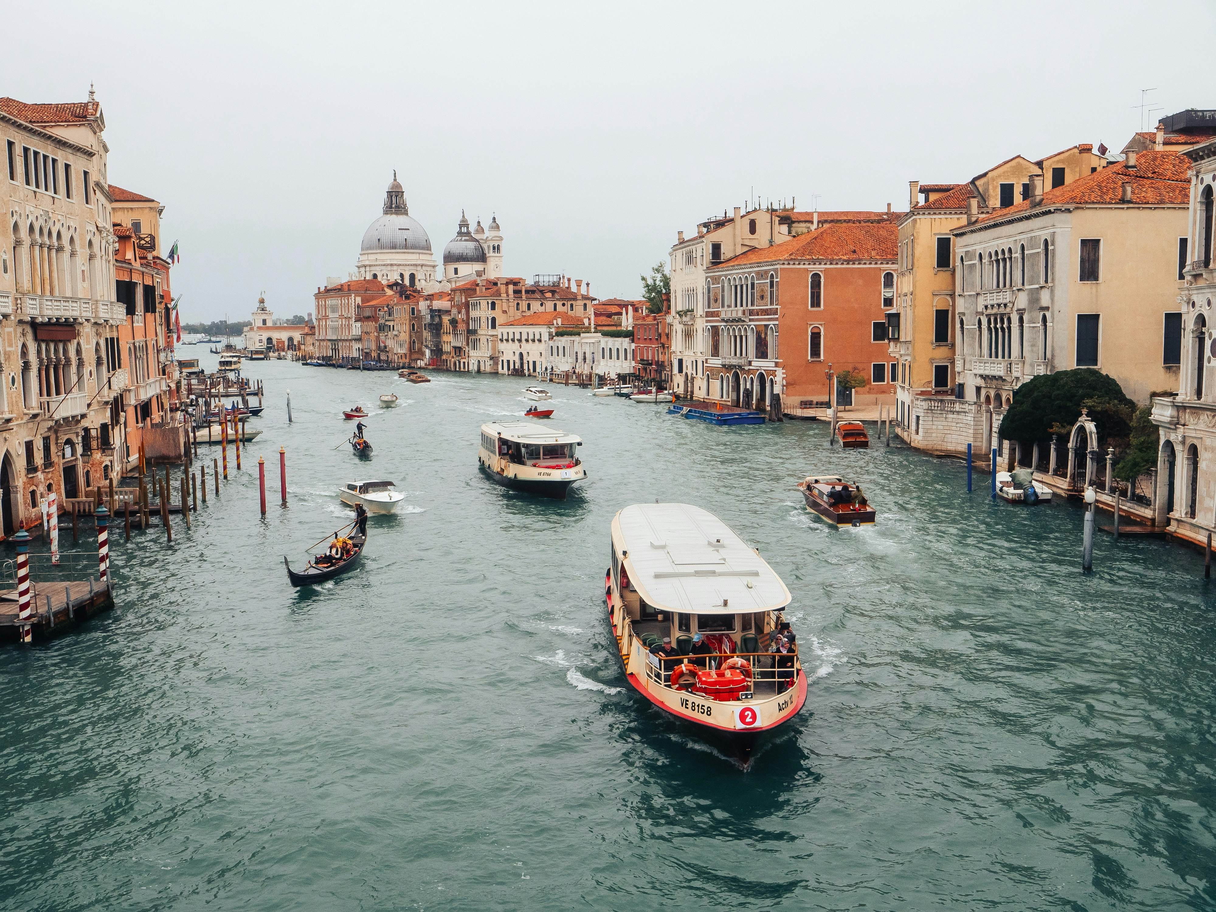 Venice, Italy-18.10.2023: Stunning view from Ponte dell'Accademia bridge on busy traffic in the Grand canal. Low cloudy sky., License Type: media, Download Time: 2025-07-01T20:30:48.000Z, User: lonelyplanetmedia, Editorial: true, purchase_order: 65050 - Digital Destinations and Articles, job: Global Publishing WIP, client: App, other: Pia Peterson Haggarty