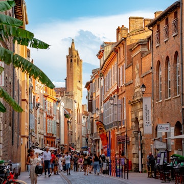 Toulouse, France - August 25 2022: People walking in the old town, License Type: media, Download Time: 2026-03-03T13:31:03.000Z, User: LP_KBaxter, Editorial: true, purchase_order: 65050 - Digital Destinations and Articles, job: lonely planet, client: The 9 best things to do in Toulouse, France, other: Kathleen Baxter