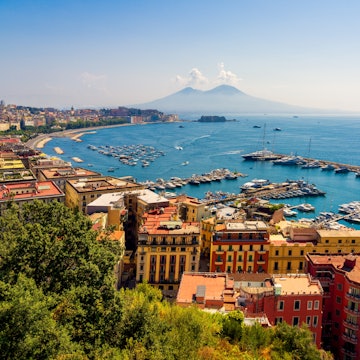 Panoramic view over Naples and harbour with Mount Vesuvius in Naples, Italy.; Shutterstock ID 2600080783; purchase_order:65050 - Digital Destinations and Articles; job:Online editorial; client:Naples things to know; other:Claire Naylor
2600080783